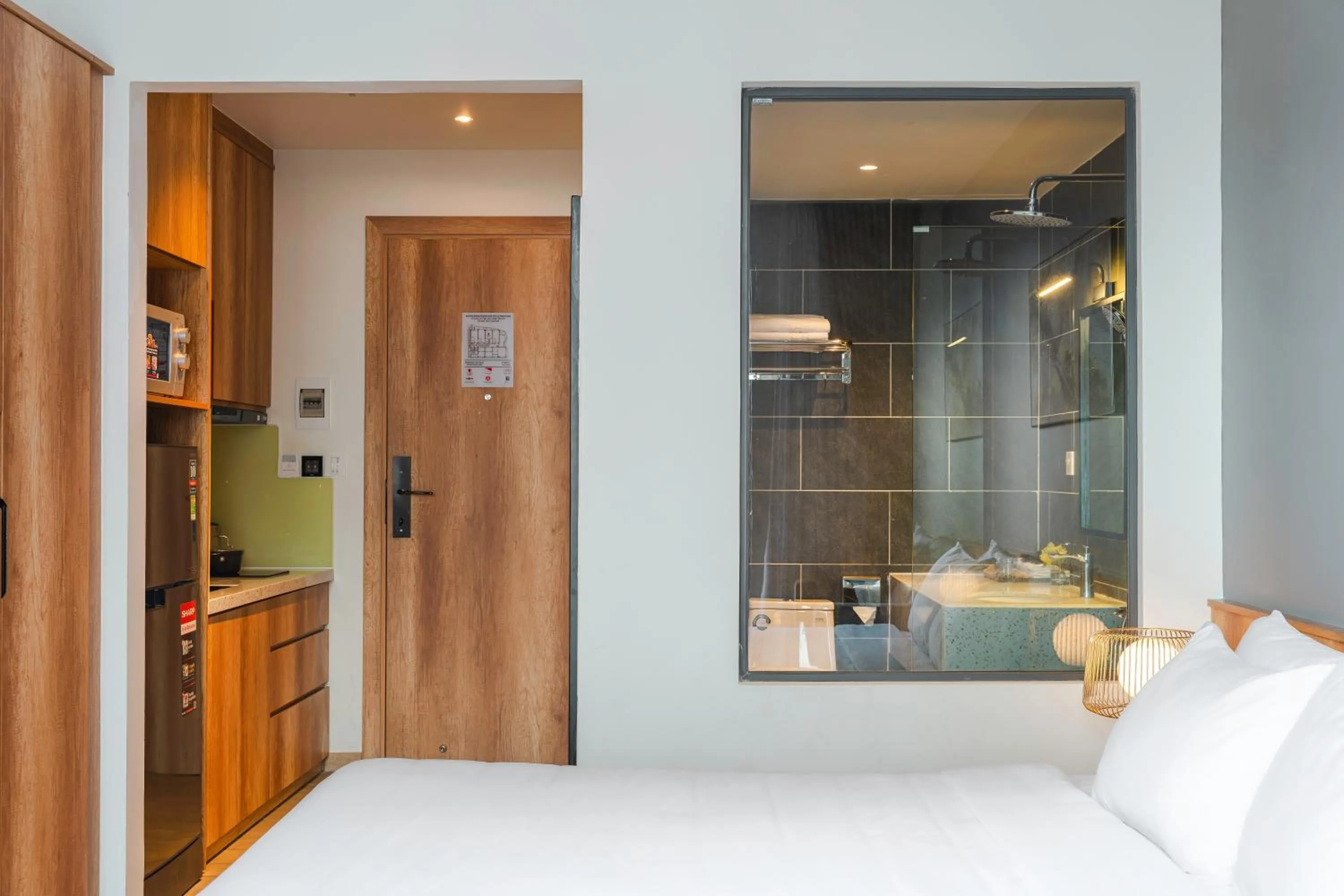 Bed in TTR Central Apart Hotel