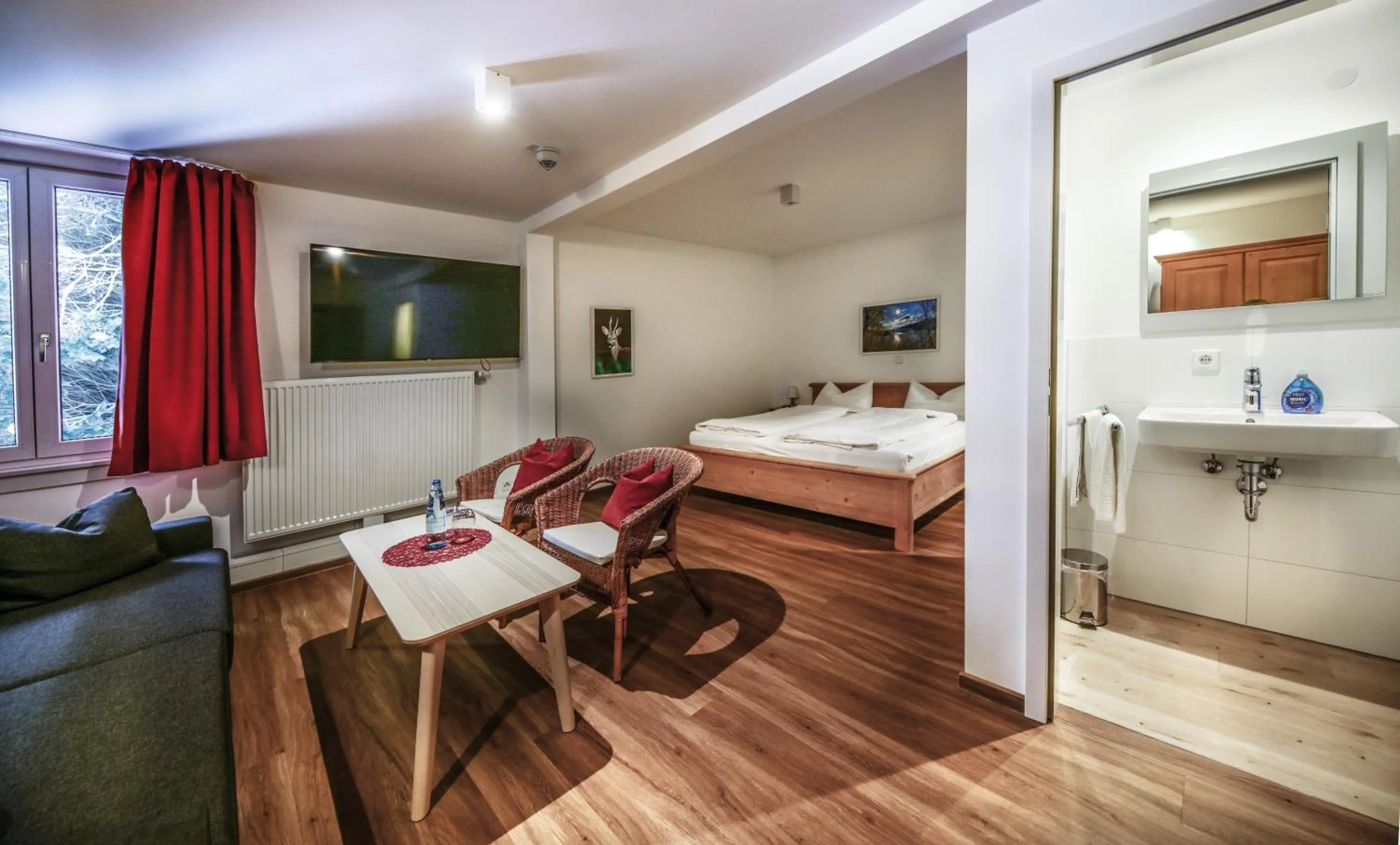 Seating area, Bed in Gasthof Lafette