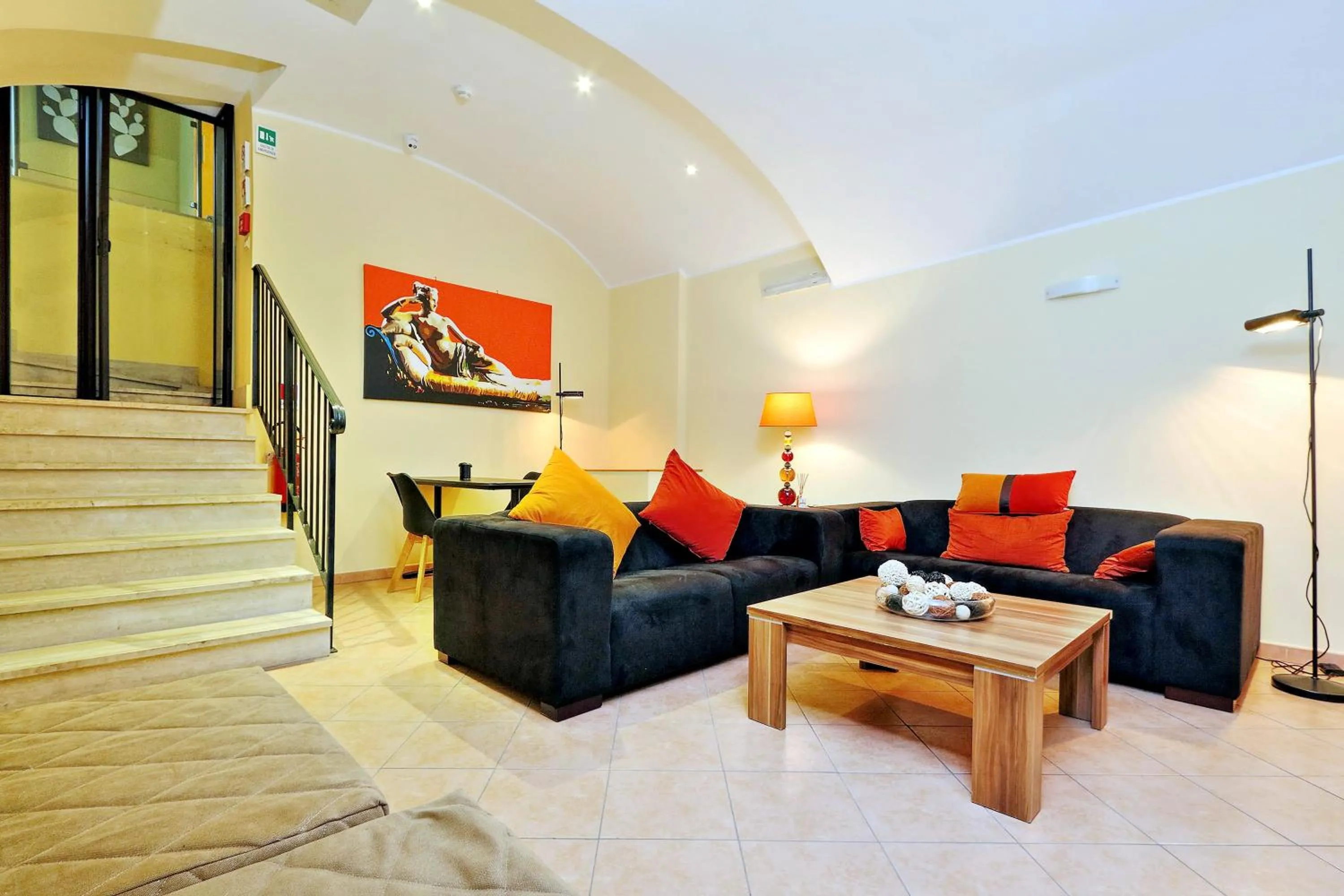 Communal lounge/ TV room in Hotel Camelia