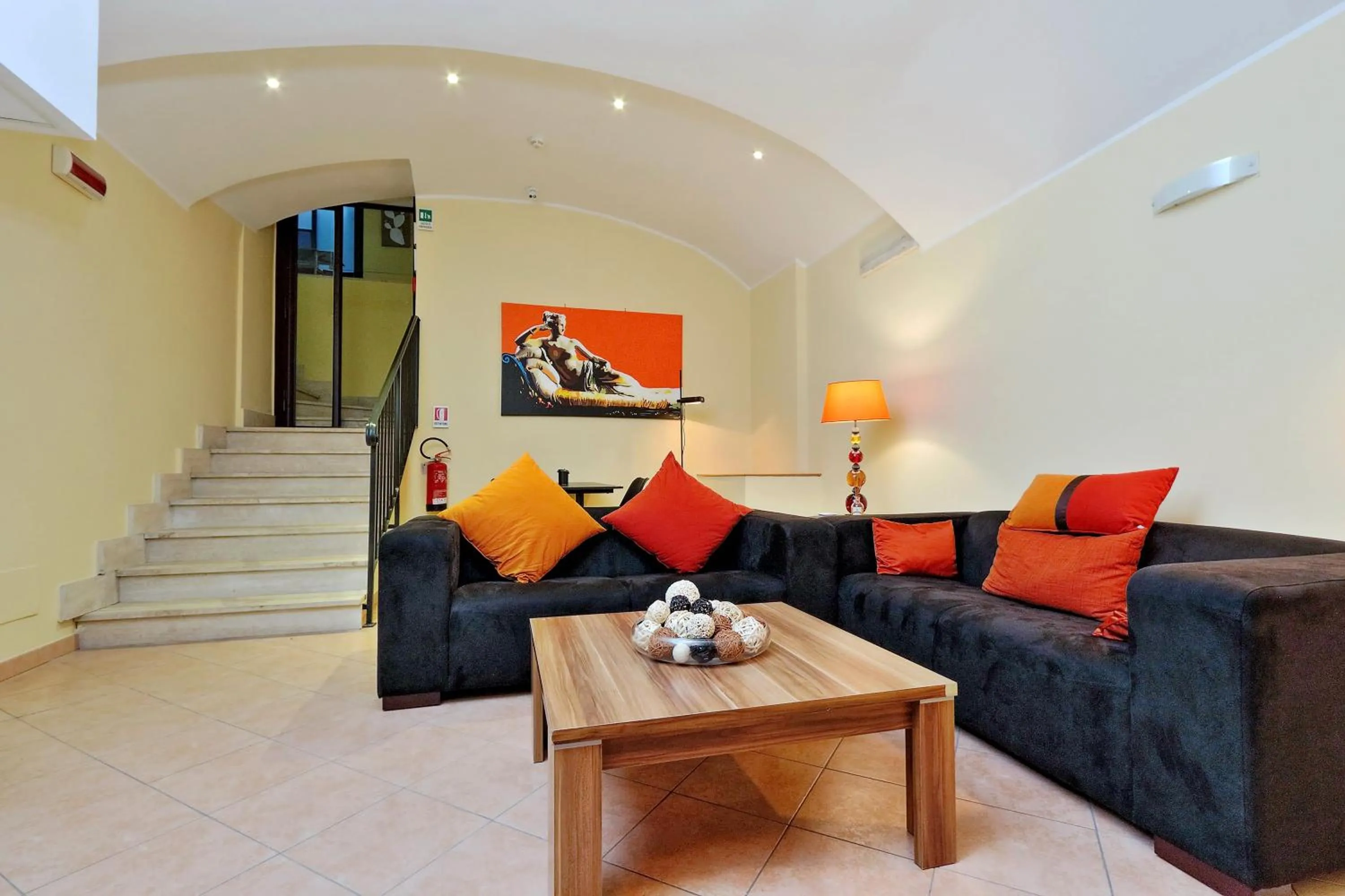 Communal lounge/ TV room in Hotel Camelia