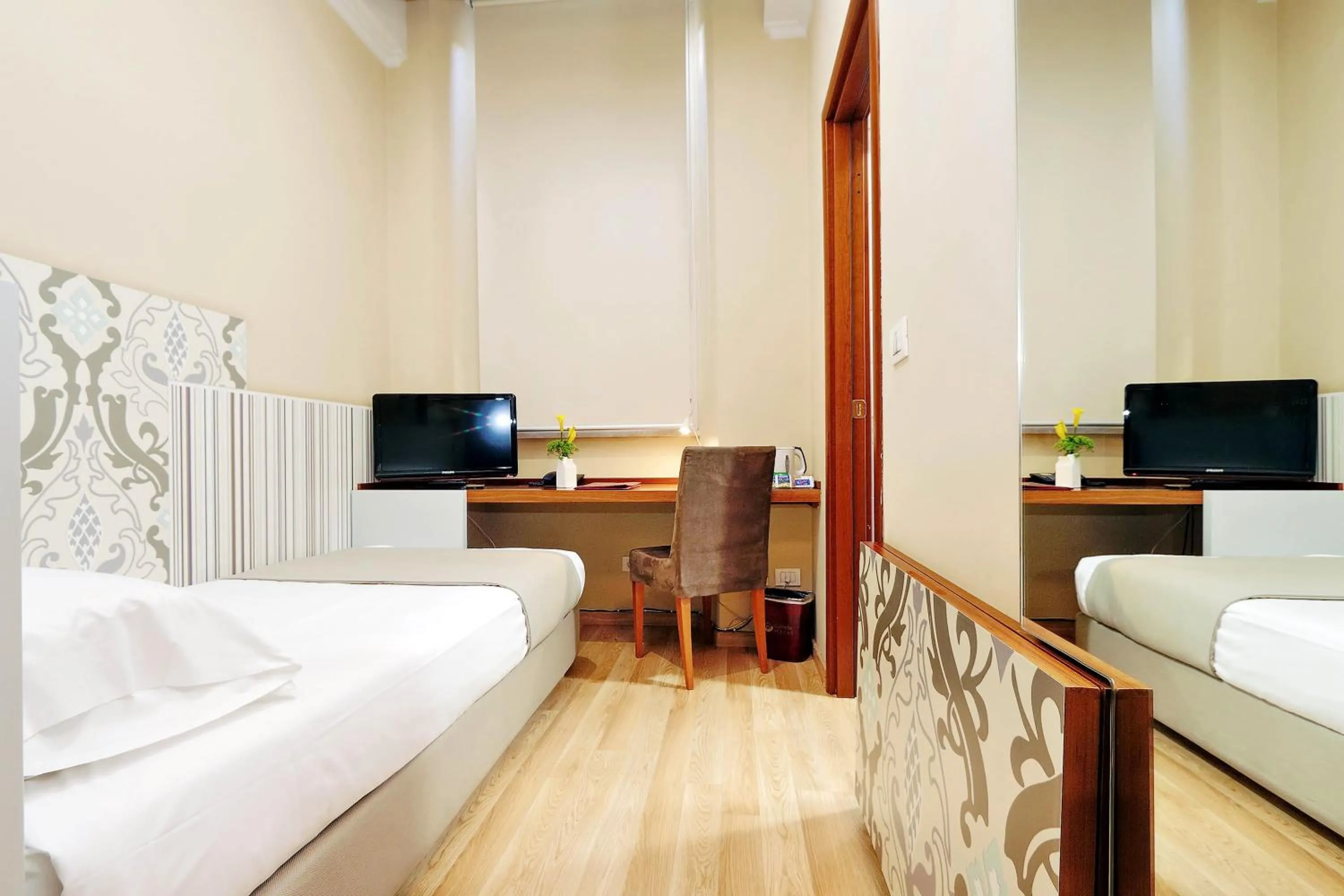 Bed in Hotel Camelia