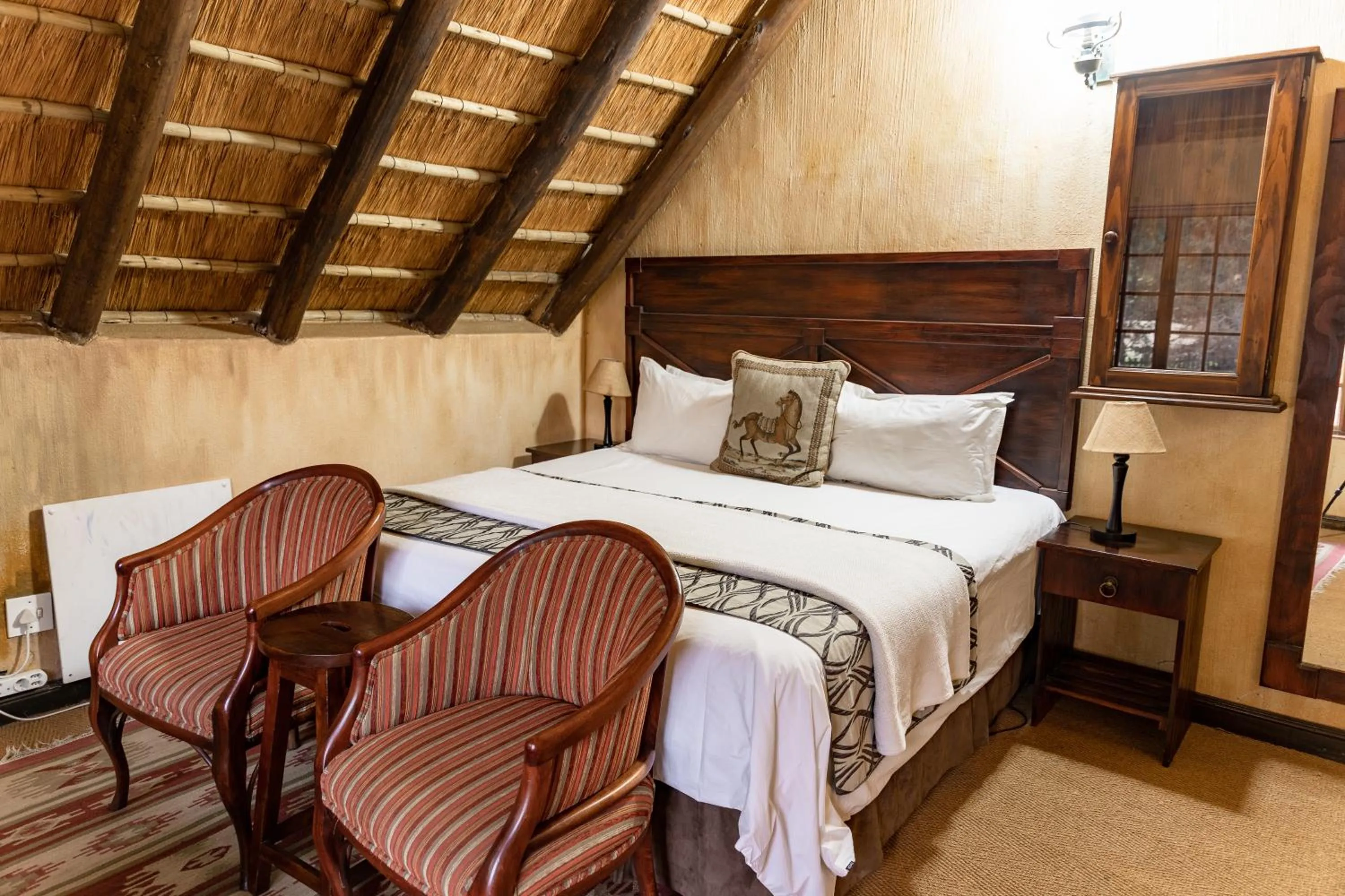 Bedroom in Hotel Nomad Belvedere Lodge