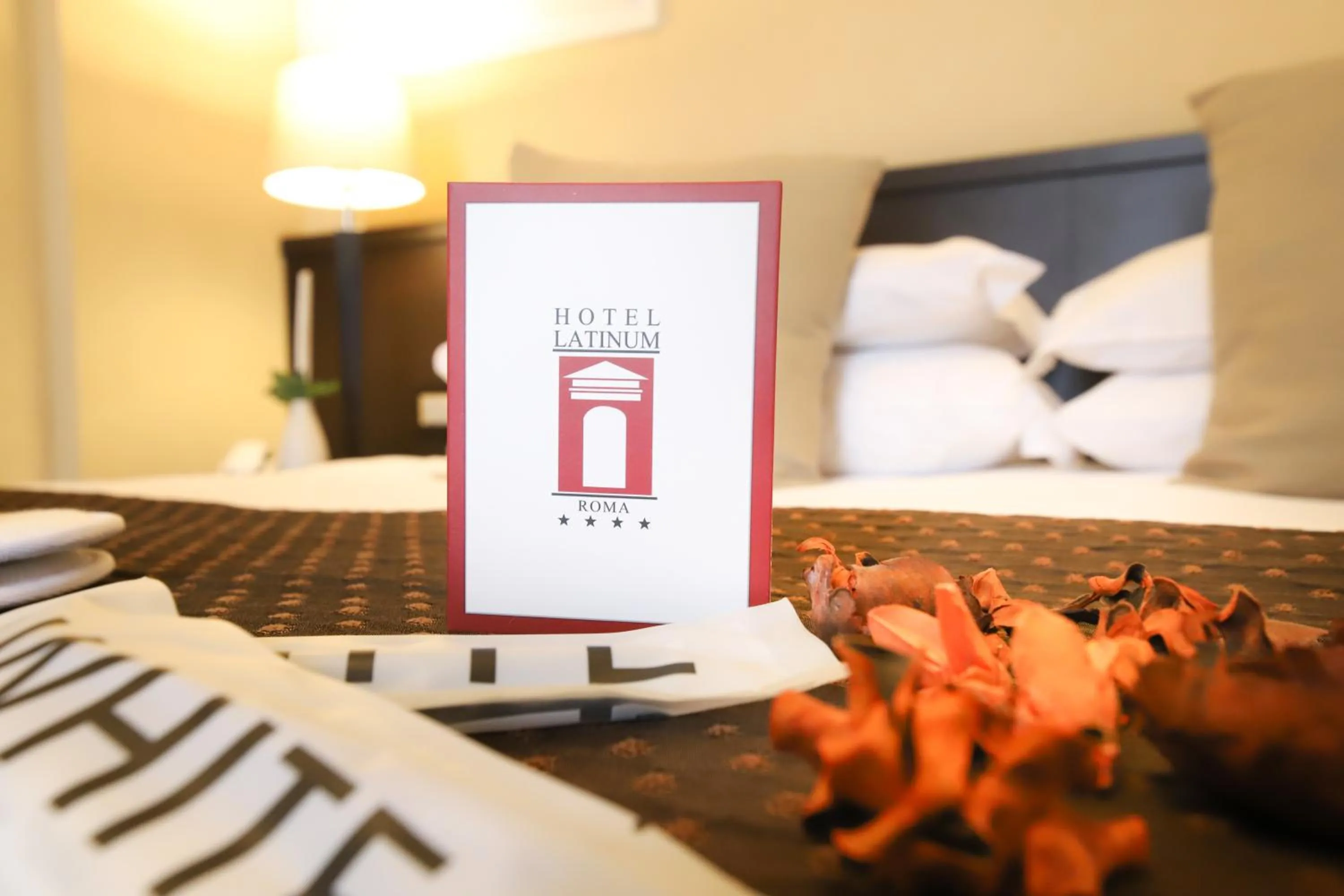 Property logo or sign in Hotel Latinum