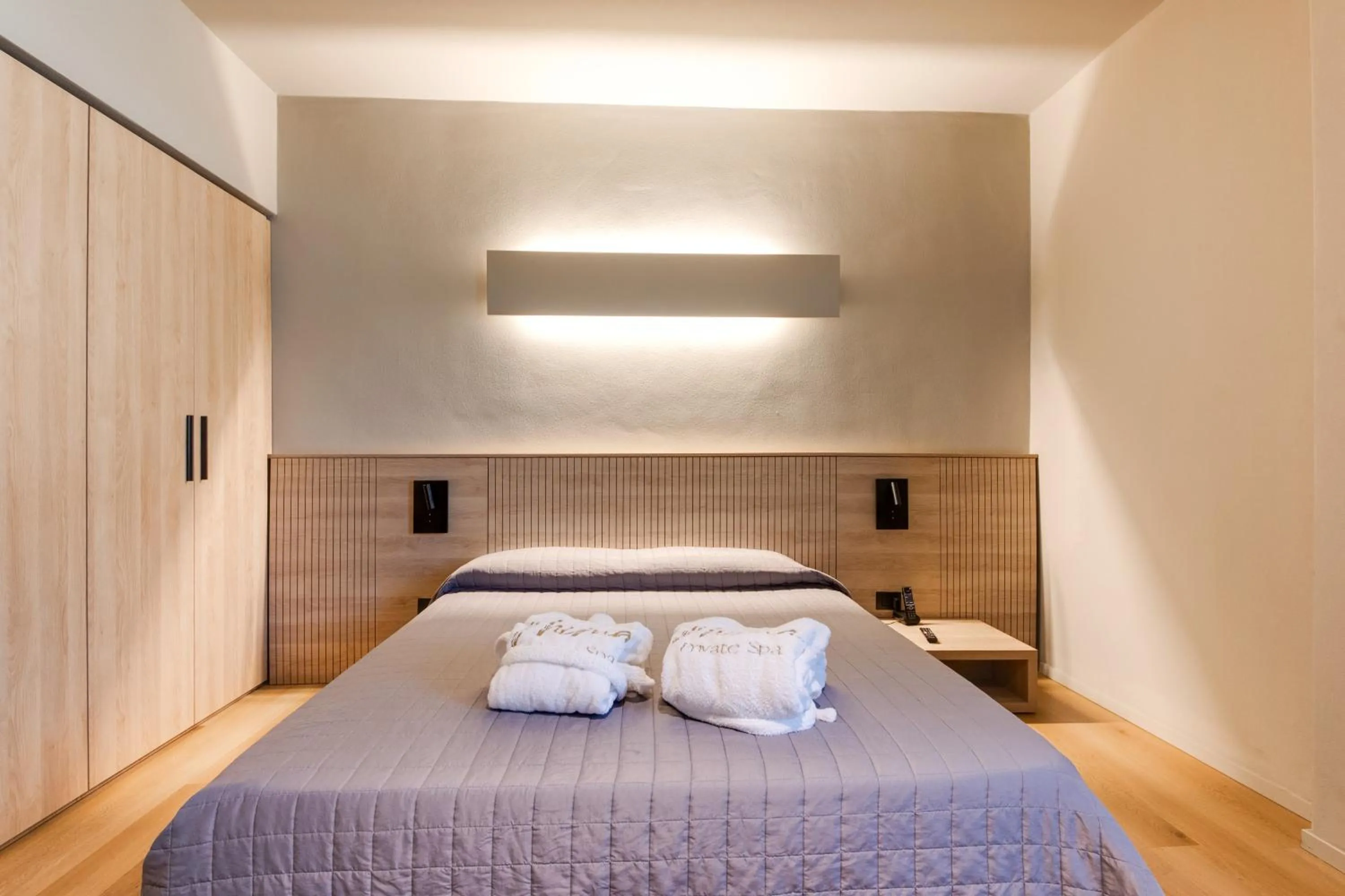 Bed in Mima Aparthotel Boutique & Spa