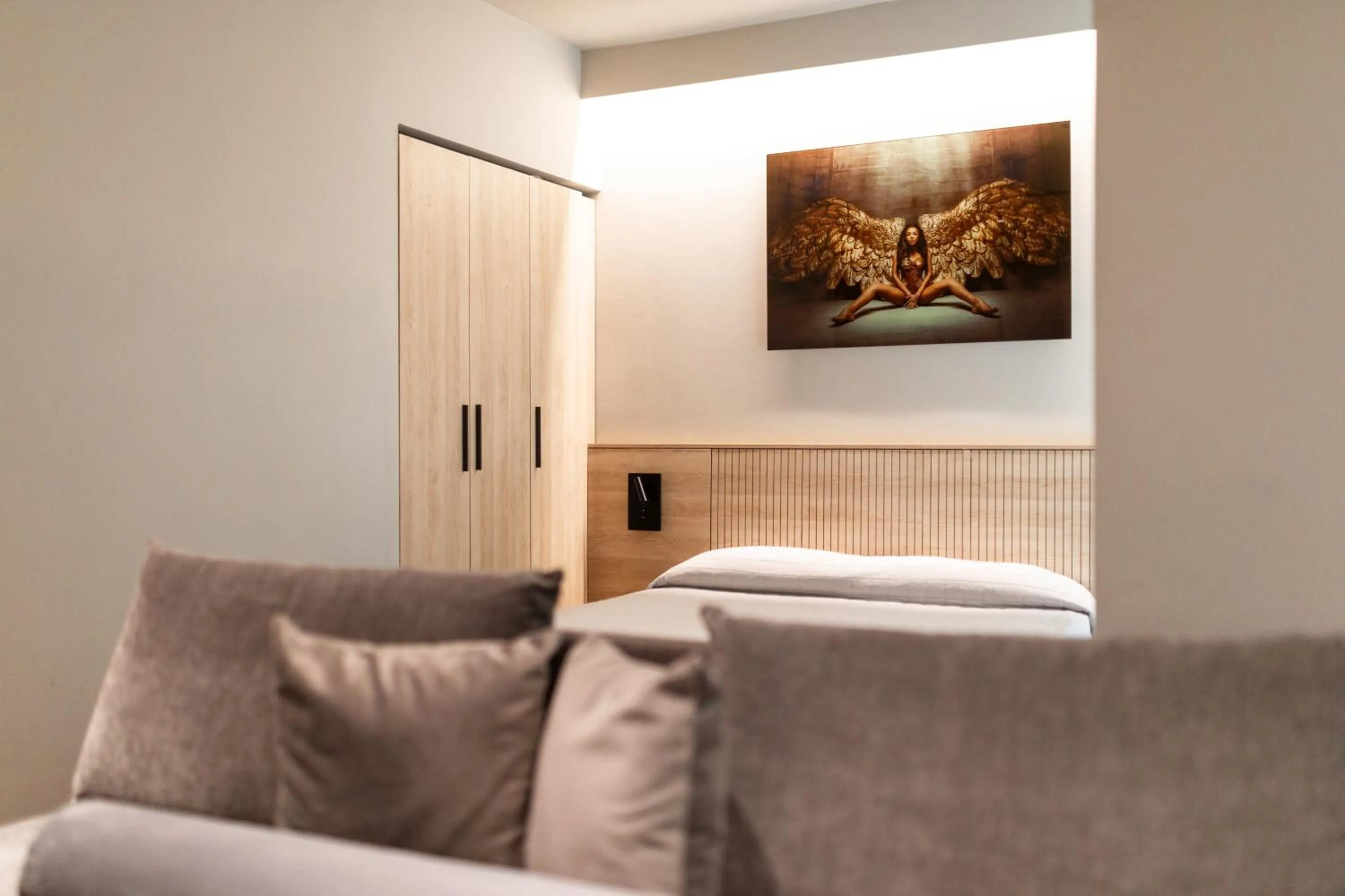 Bed in Mima Aparthotel Boutique & Spa