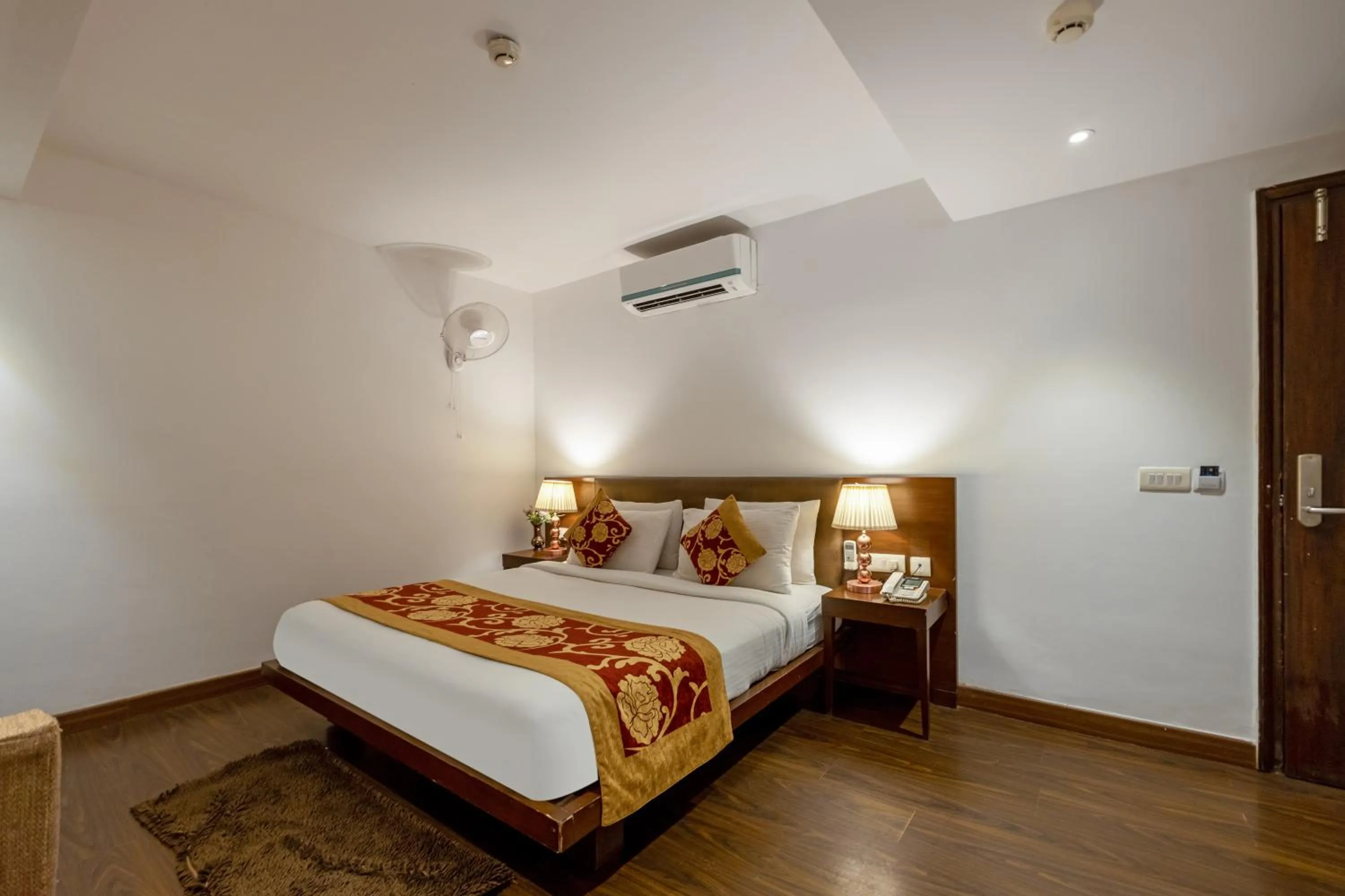 Bed in Hotel Arch Plaza at Yashobhoomi By Arch Group