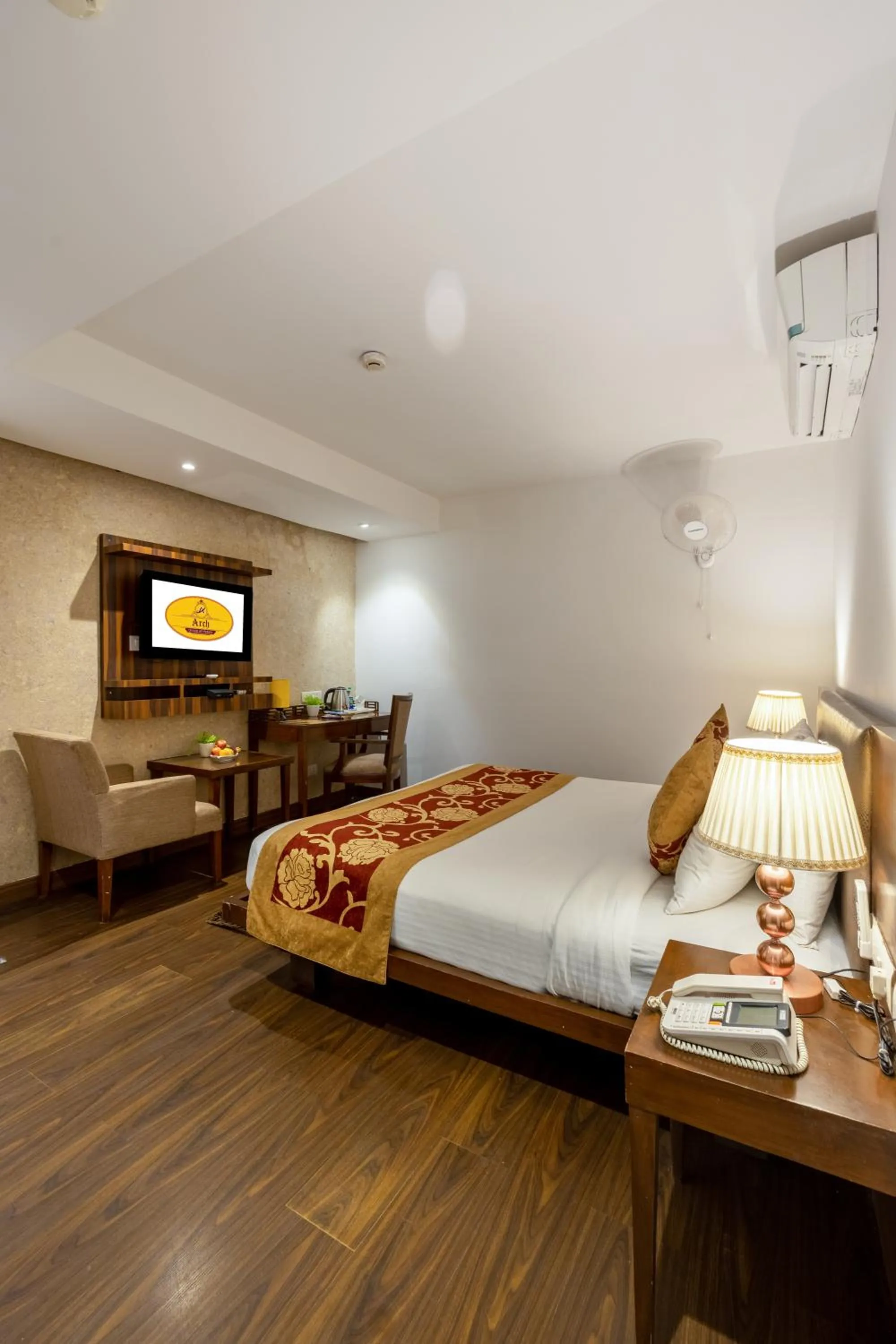 Bed in Hotel Arch Plaza at Yashobhoomi By Arch Group