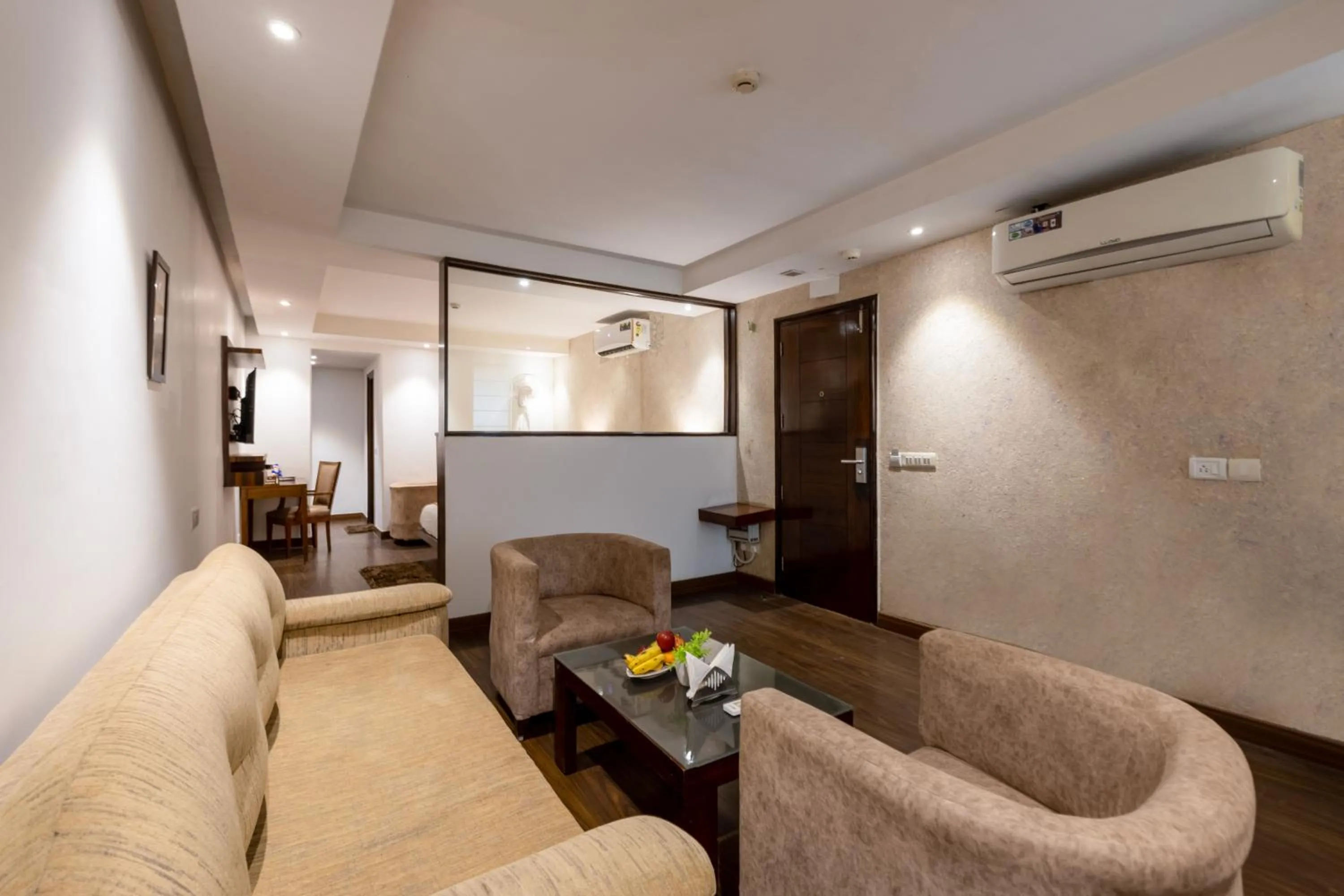 Living room in Hotel Arch Plaza at Yashobhoomi By Arch Group