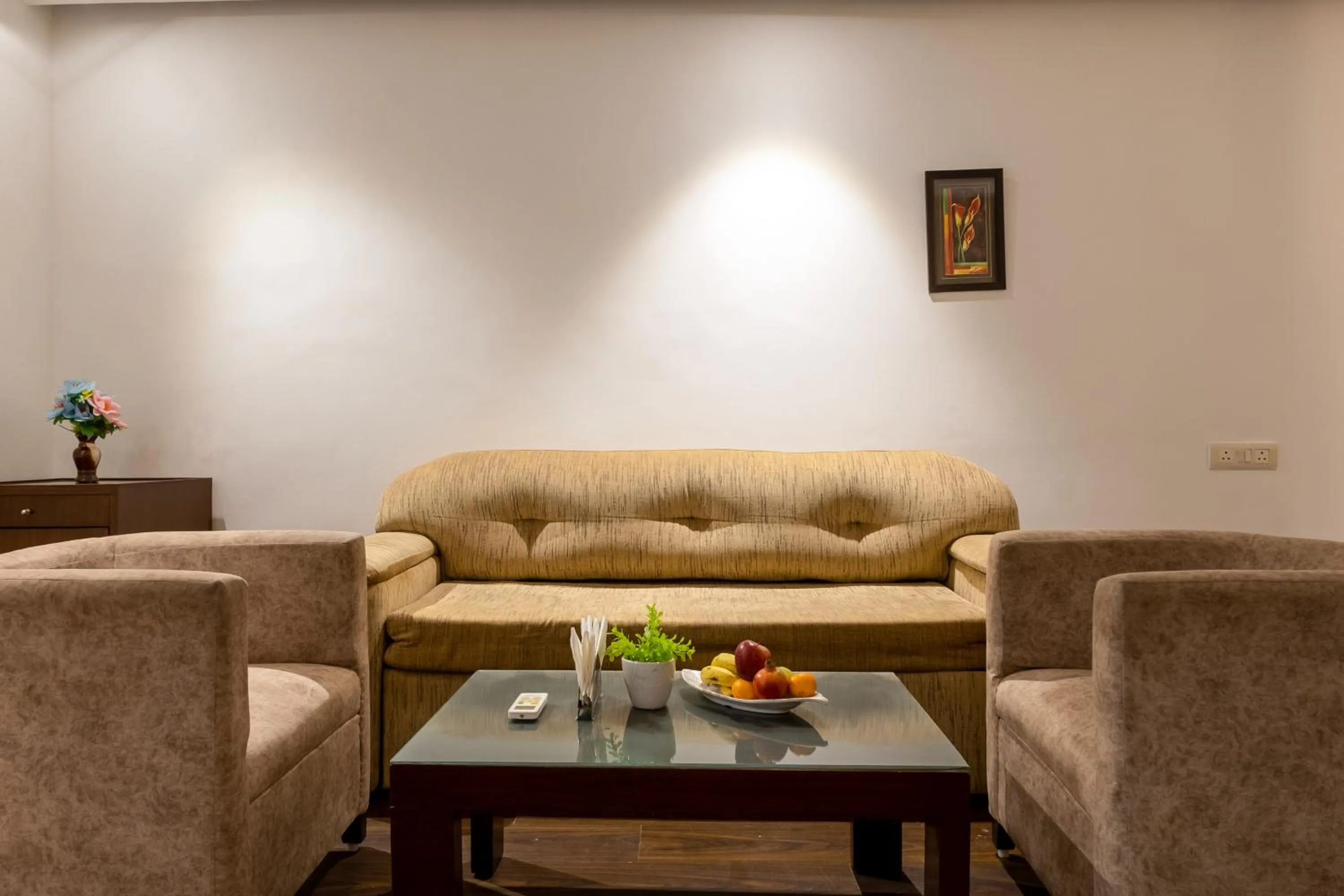 Living room in Hotel Arch Plaza at Yashobhoomi By Arch Group
