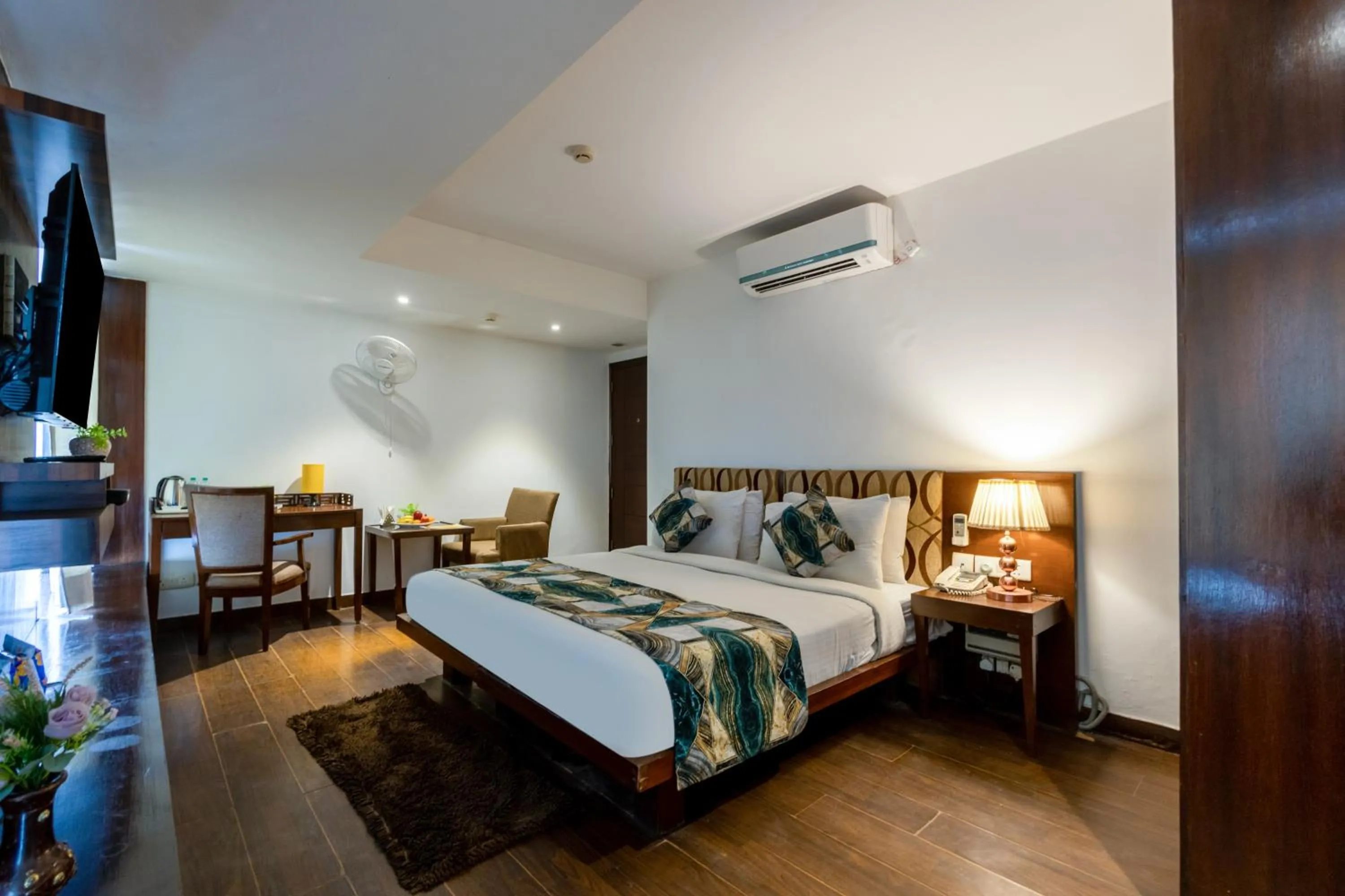 Bed in Hotel Arch Plaza at Yashobhoomi By Arch Group