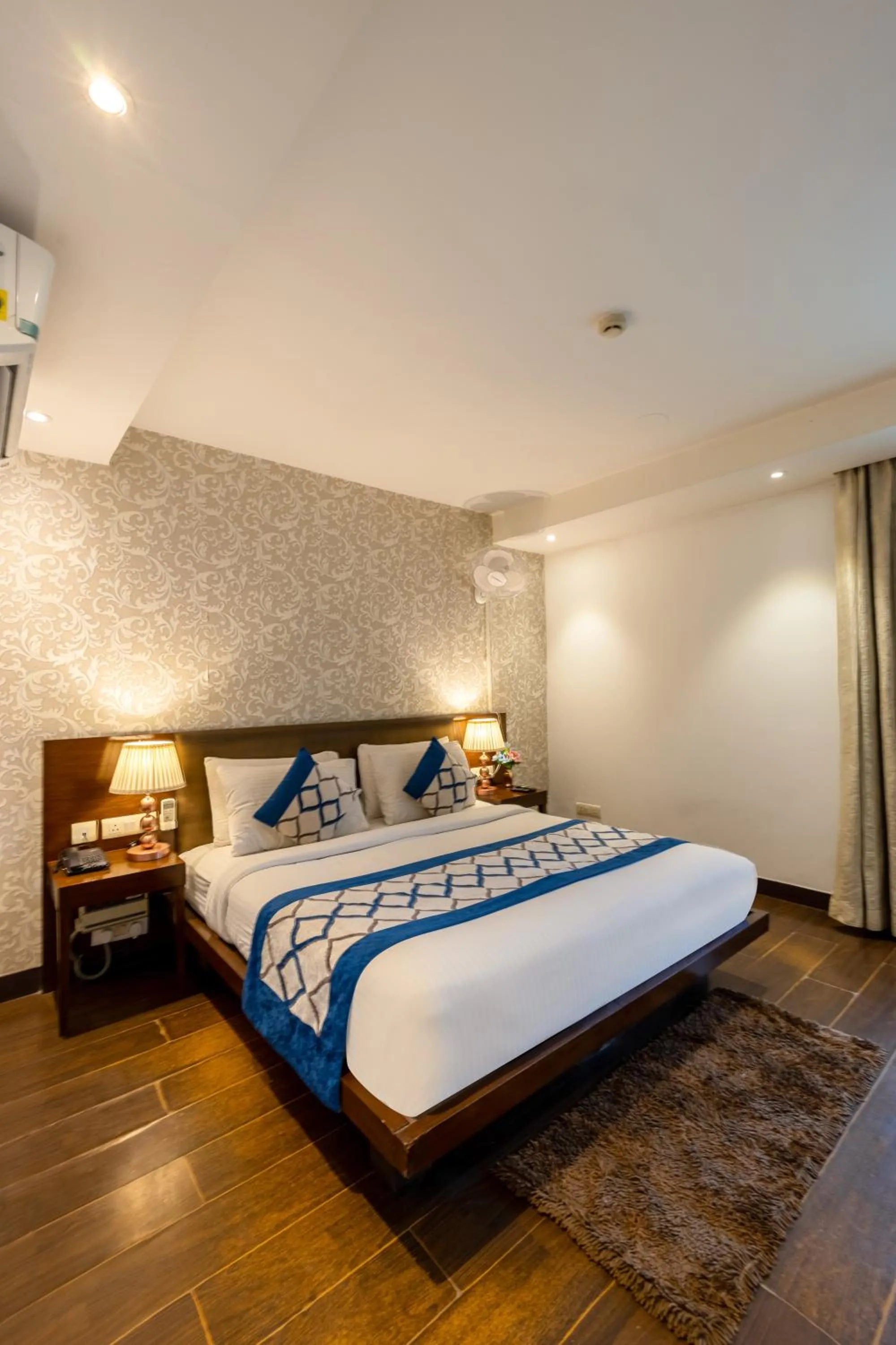 Bed in Hotel Arch Plaza at Yashobhoomi By Arch Group