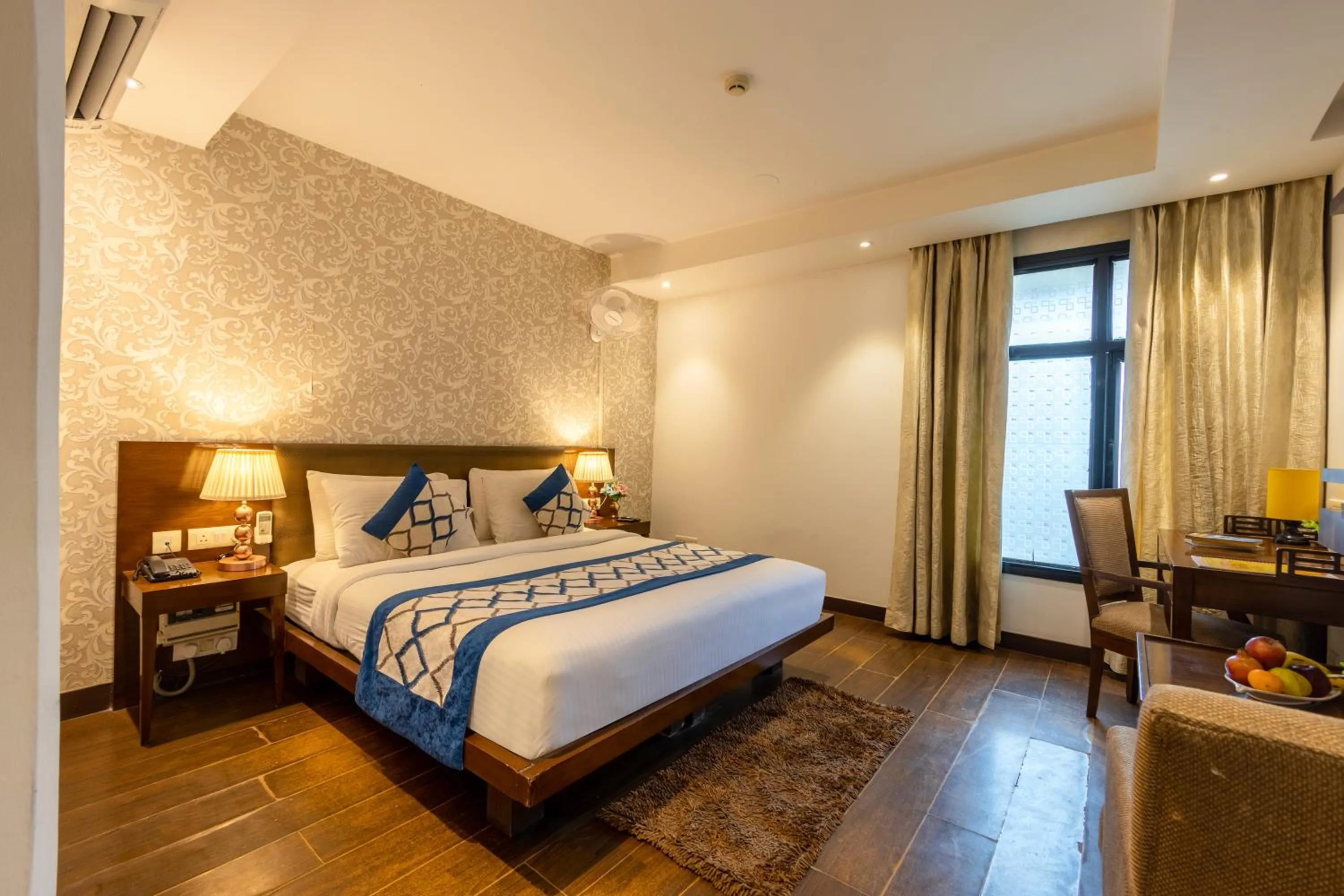 Bed in Hotel Arch Plaza at Yashobhoomi By Arch Group