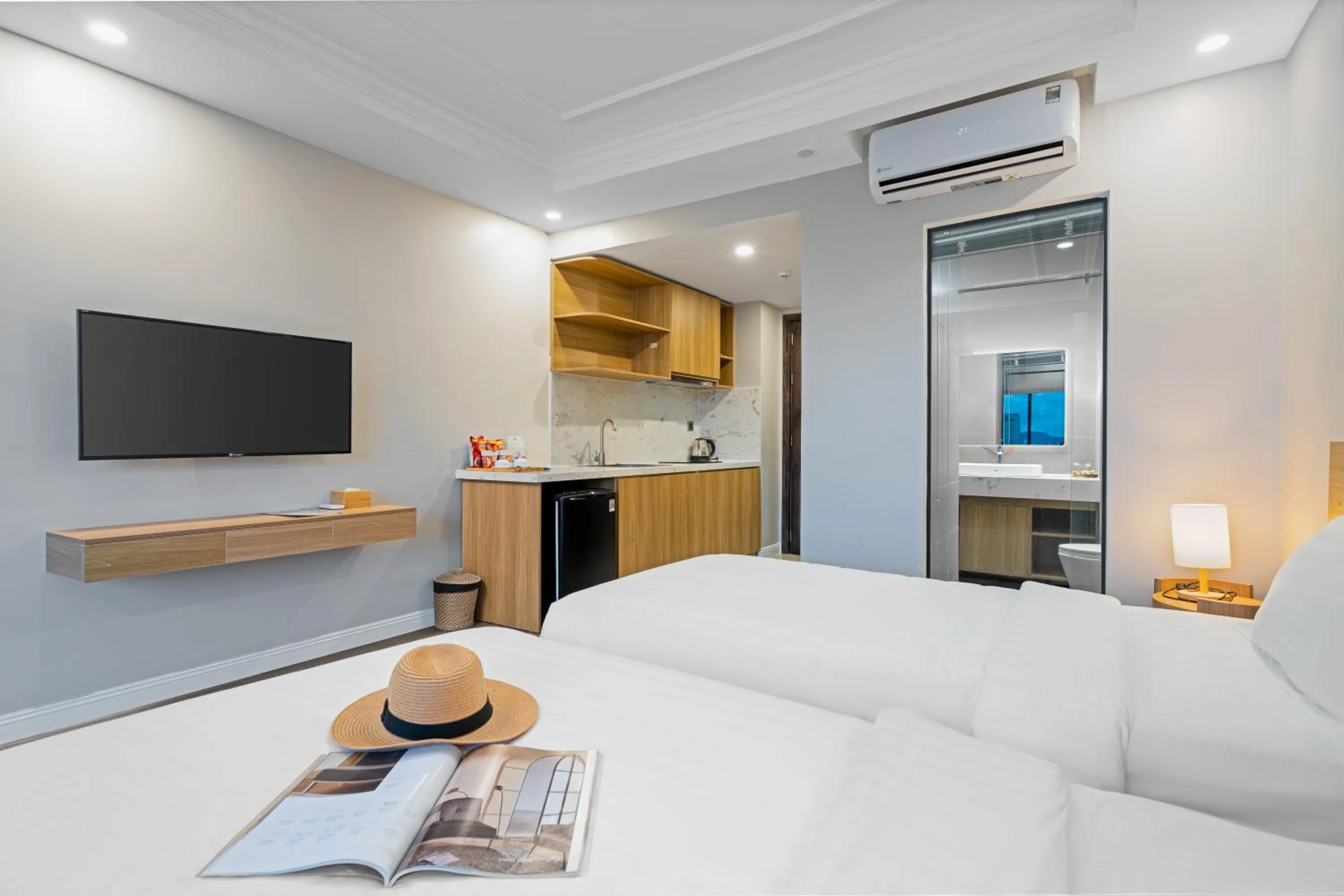 Bed in Le Cap Gym Hotel & Apartments