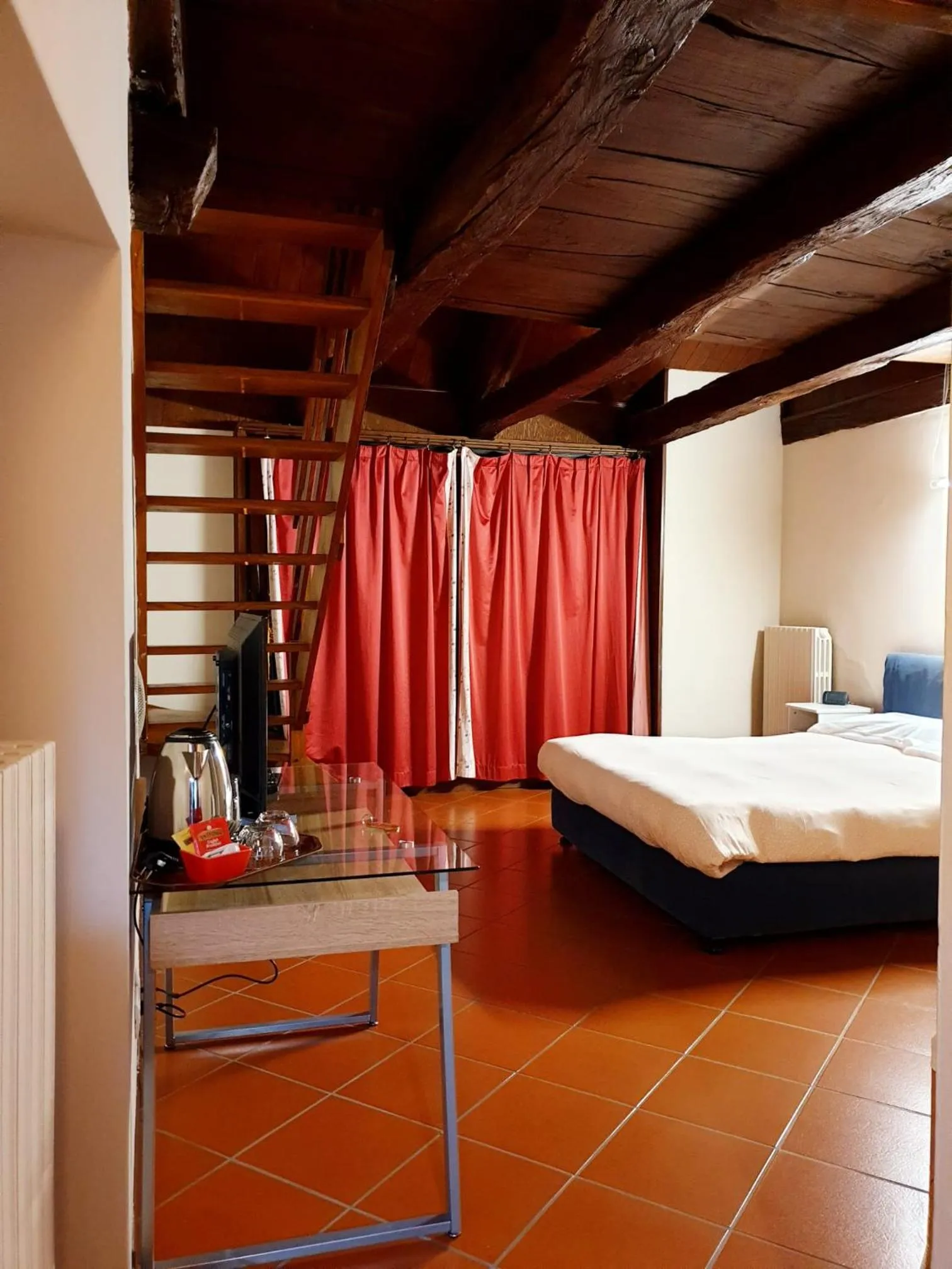 Bed in Piccolo Hotel Olina
