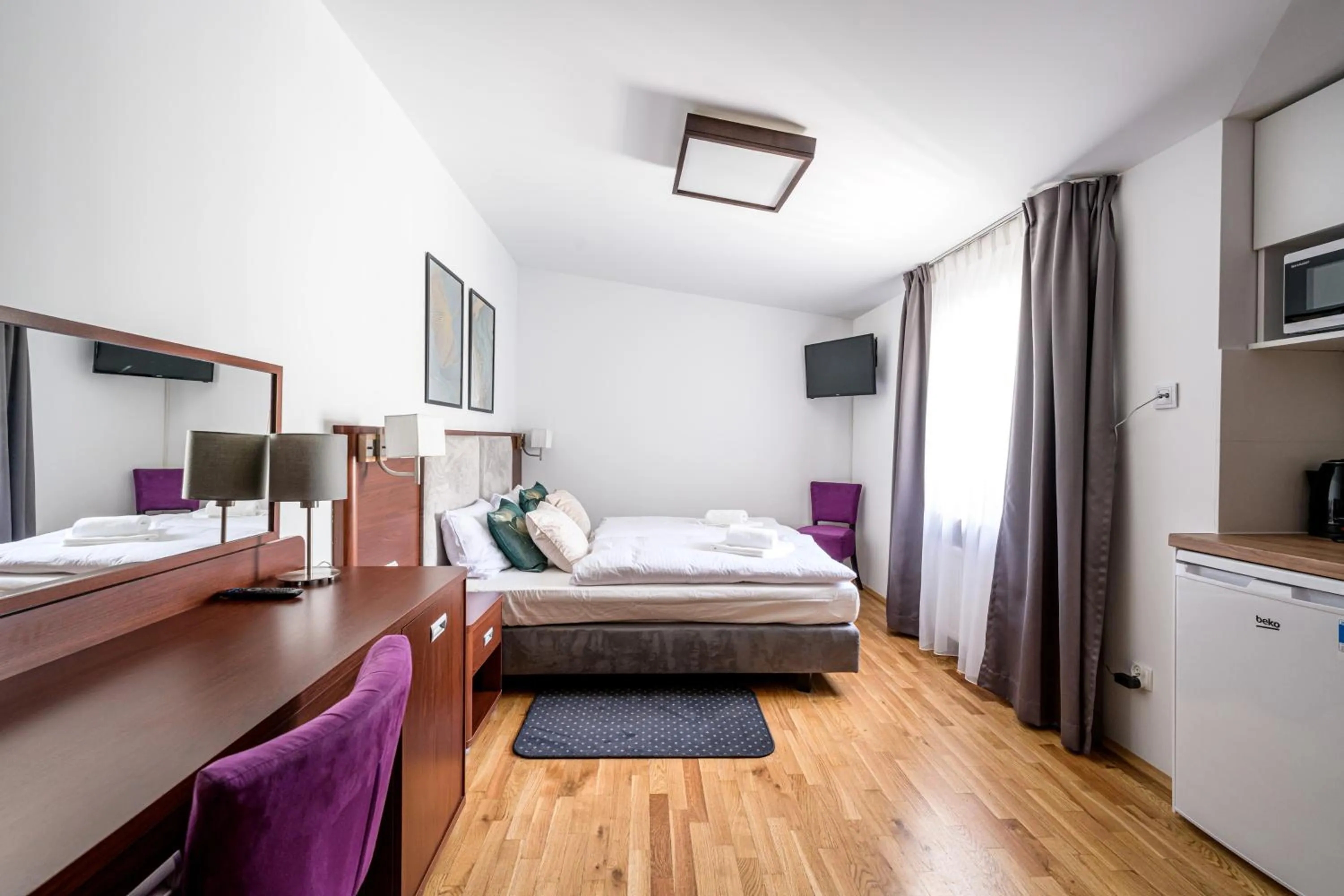 Bed in ON/SET APARTHOTEL