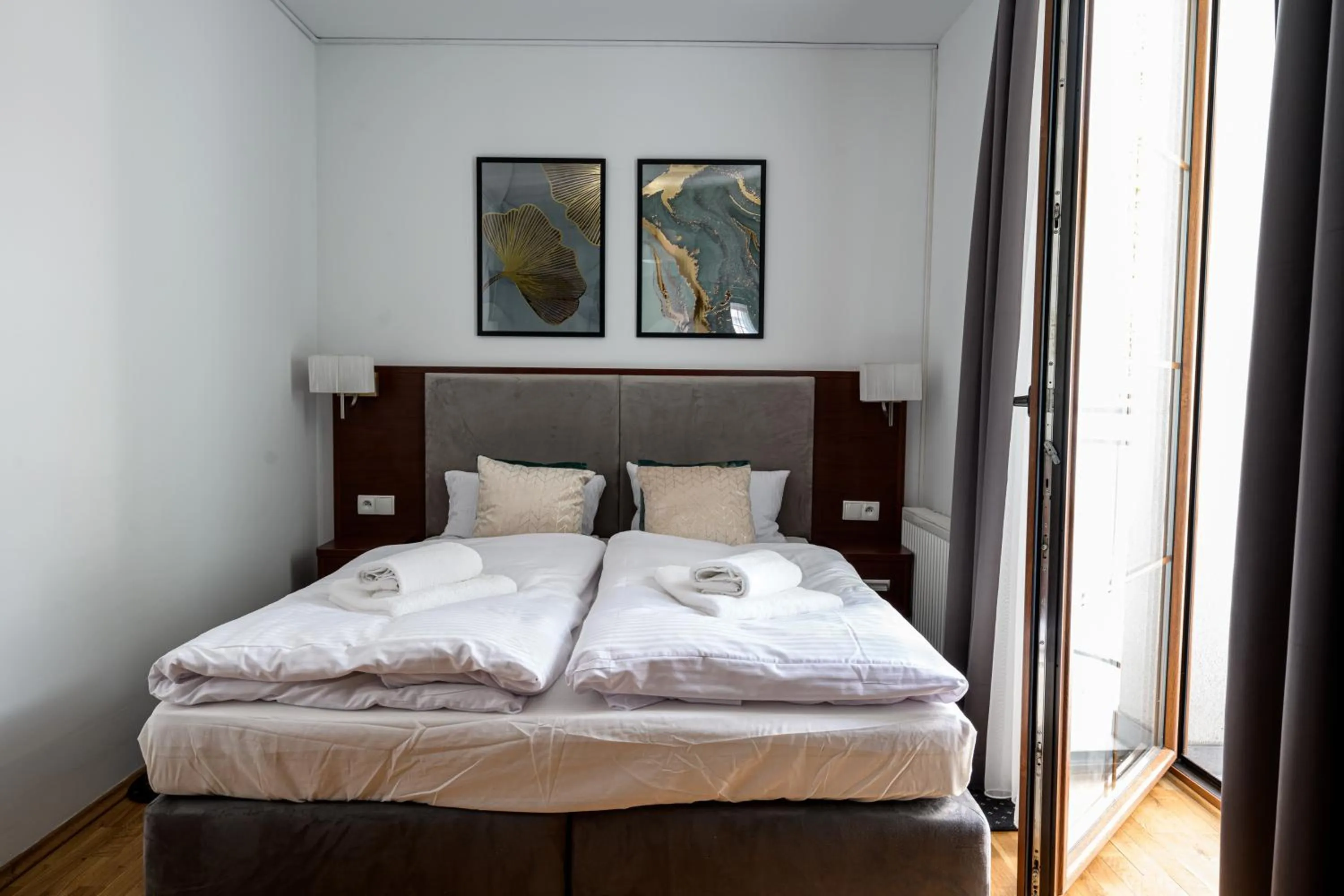 Bed in ON/SET APARTHOTEL