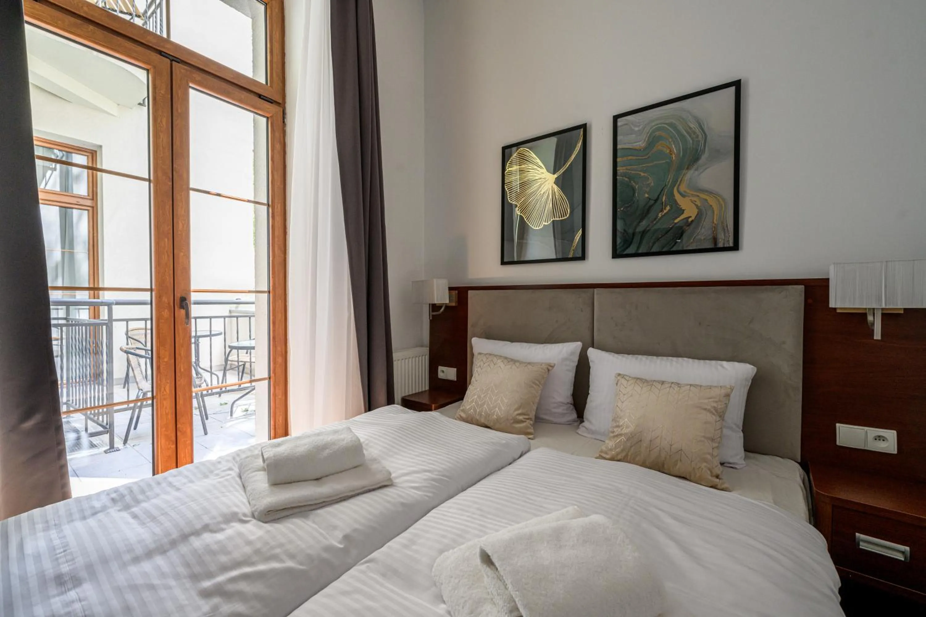 Bed in ON/SET APARTHOTEL