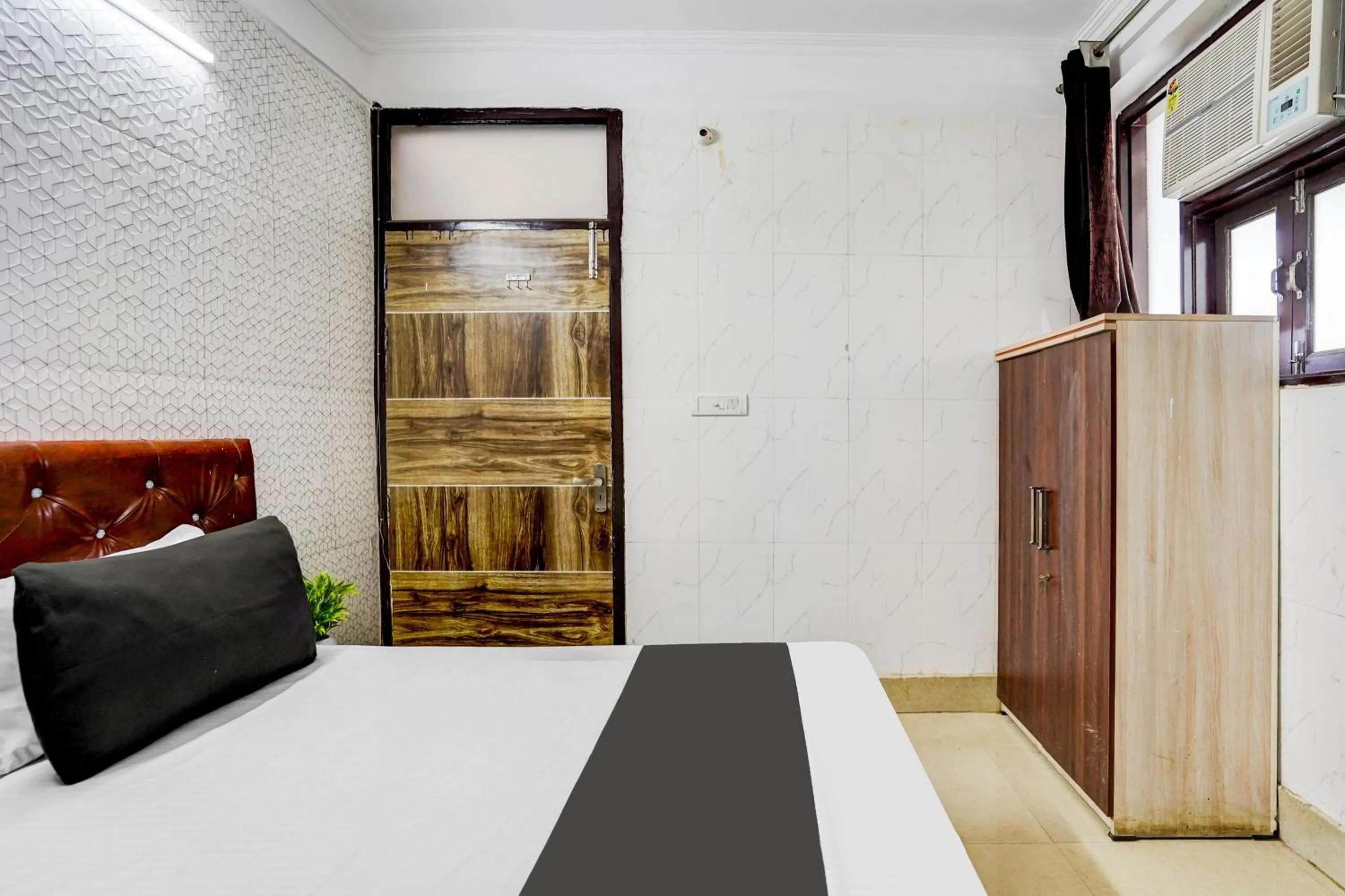 Bedroom in Hotel O The Maruti hotel