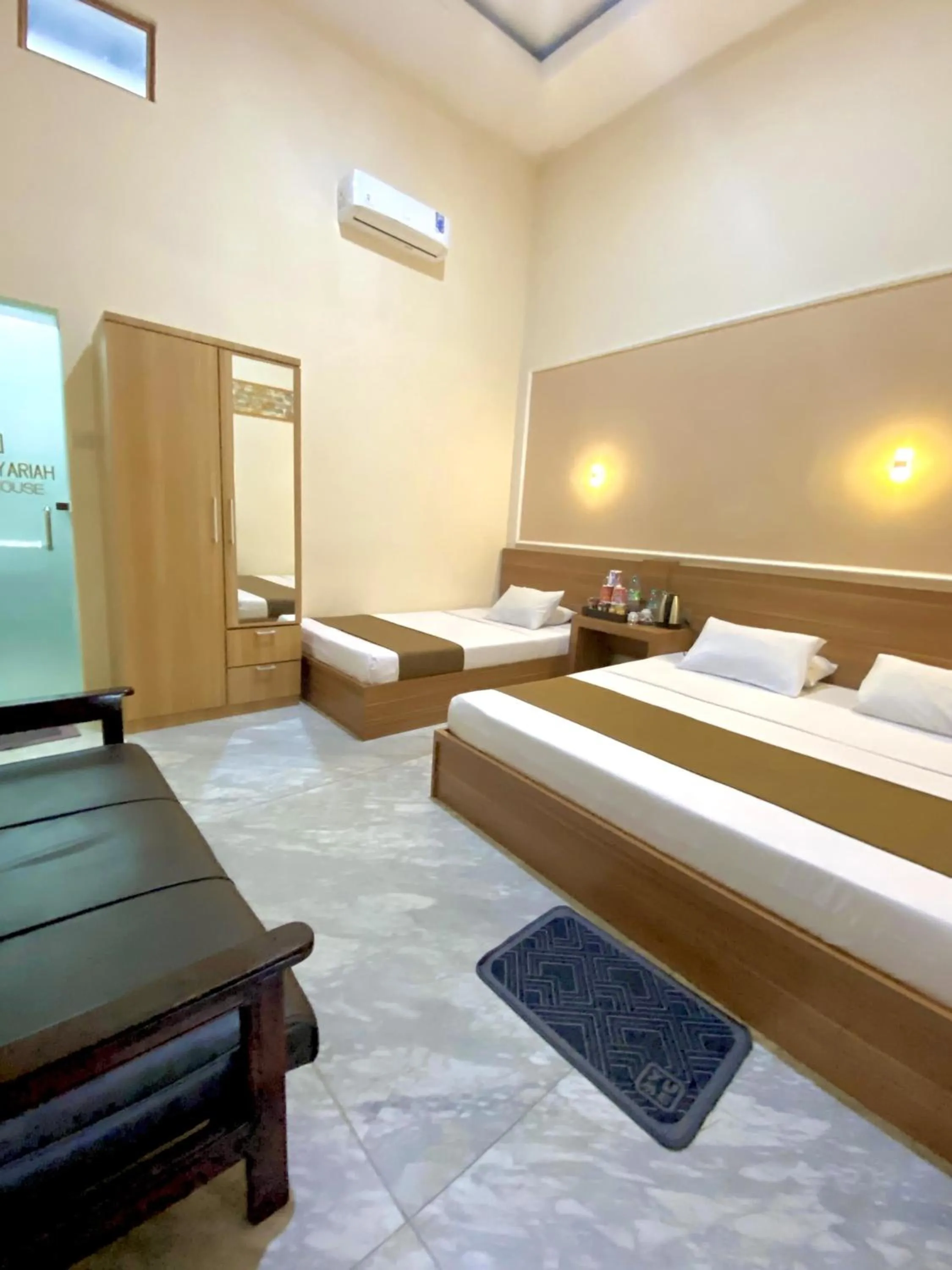 Bed in Al-Kiswah Syariah Guest House