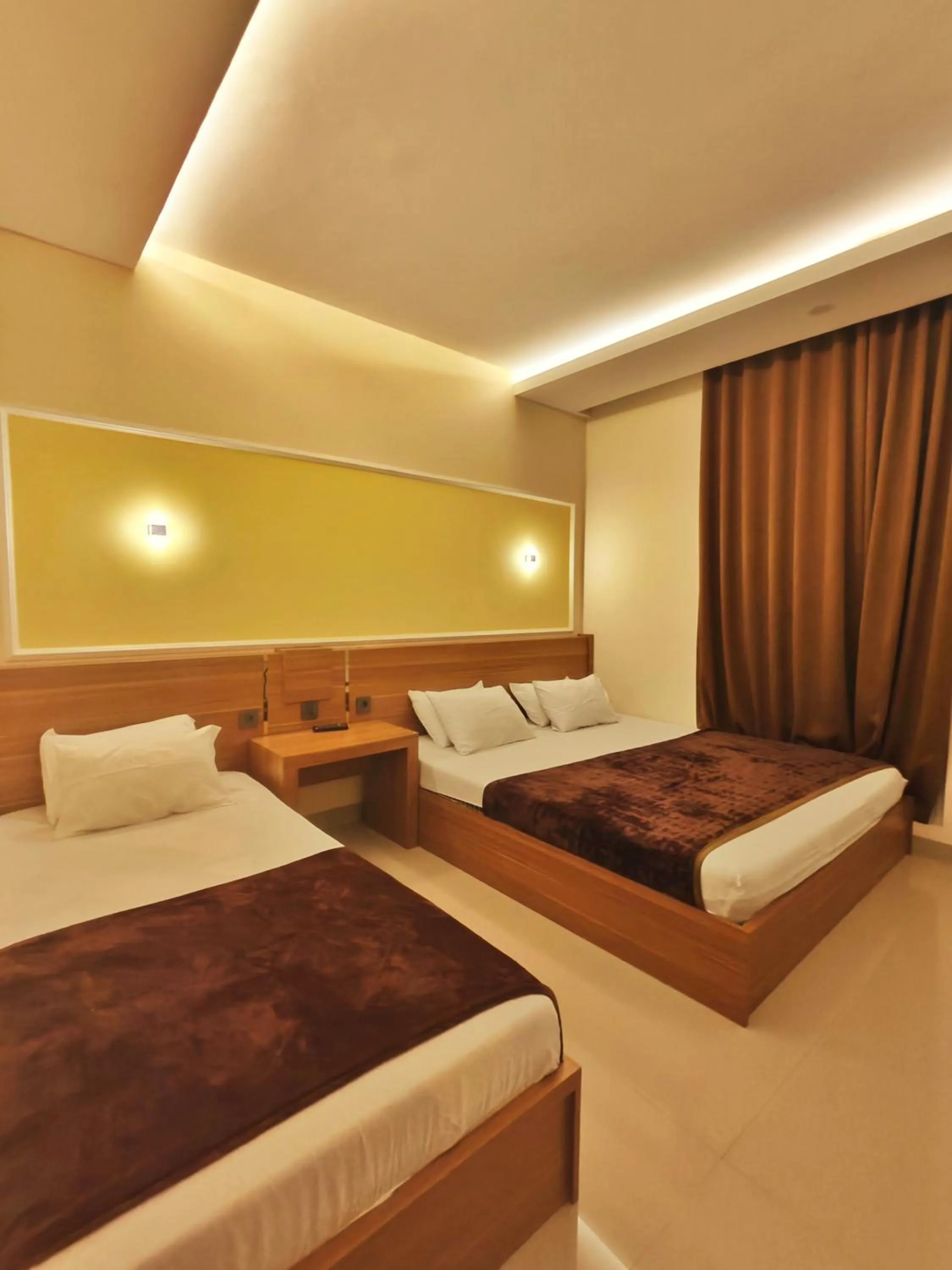 Bed in Al-Kiswah Syariah Guest House