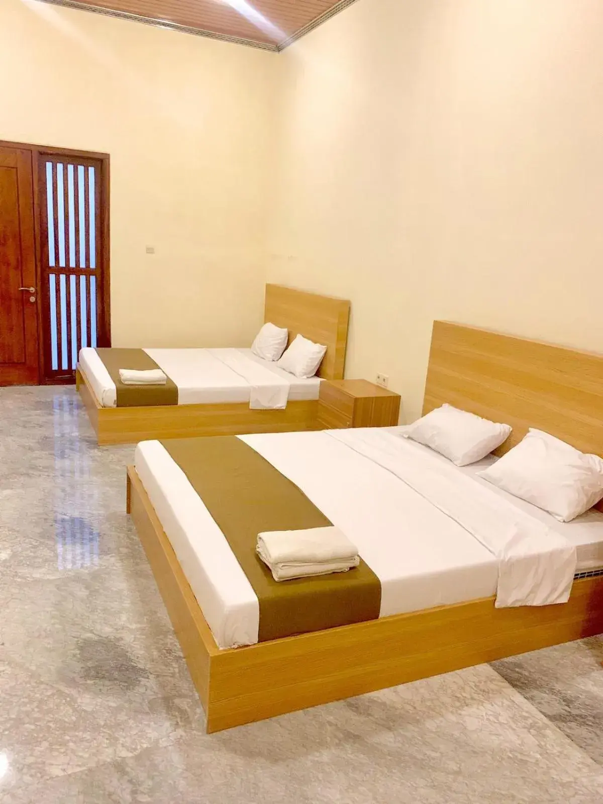 Luxury Quadruple Room in Al-Kiswah Syariah Guest House Luxury Quadruple Room in Al-Kiswah Syariah Guest House