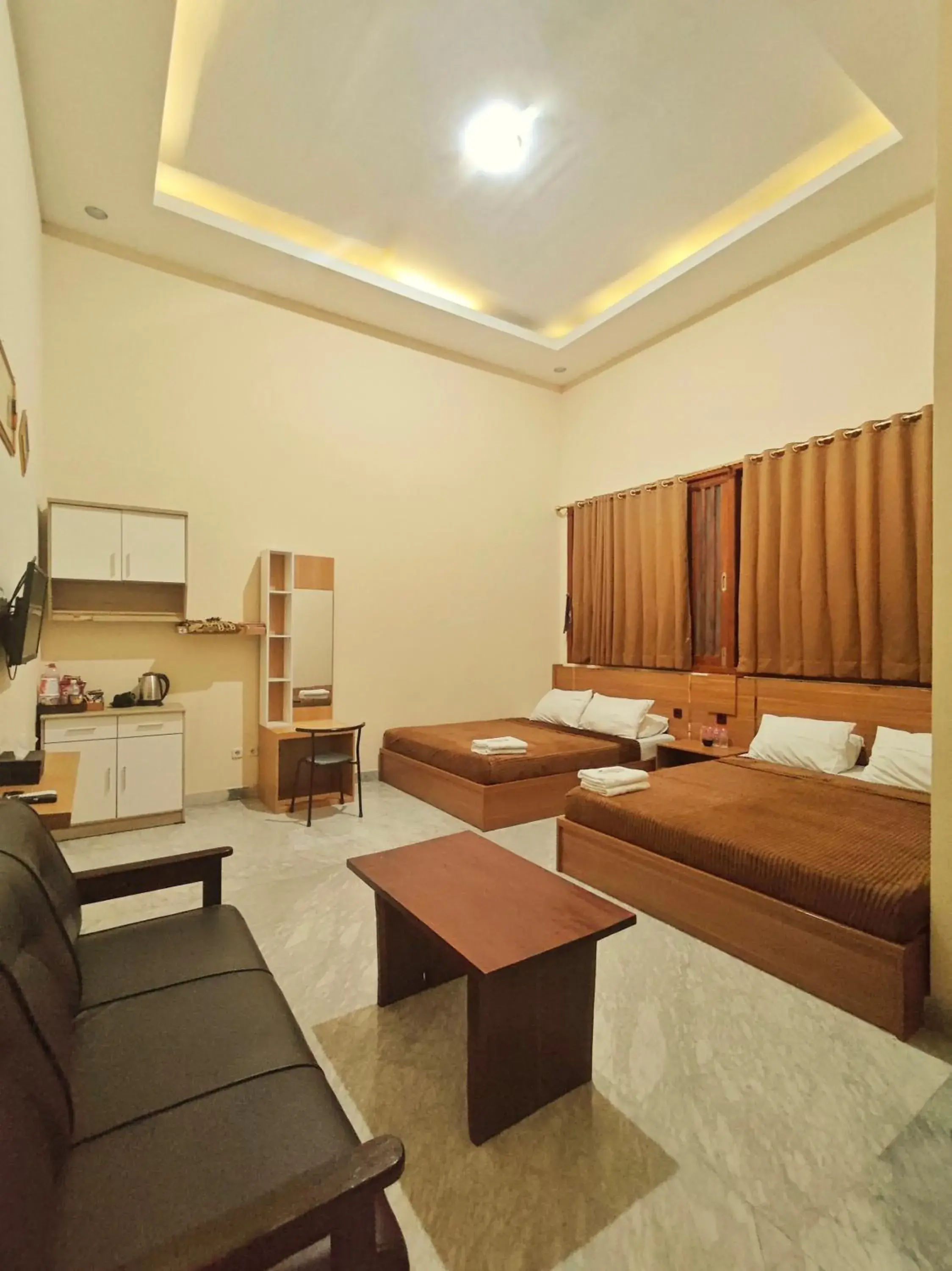 Deluxe Queen Room with Two Queen Beds in Al-Kiswah Syariah Guest House Deluxe Queen Room with Two Queen Beds in Al-Kiswah Syariah Guest House