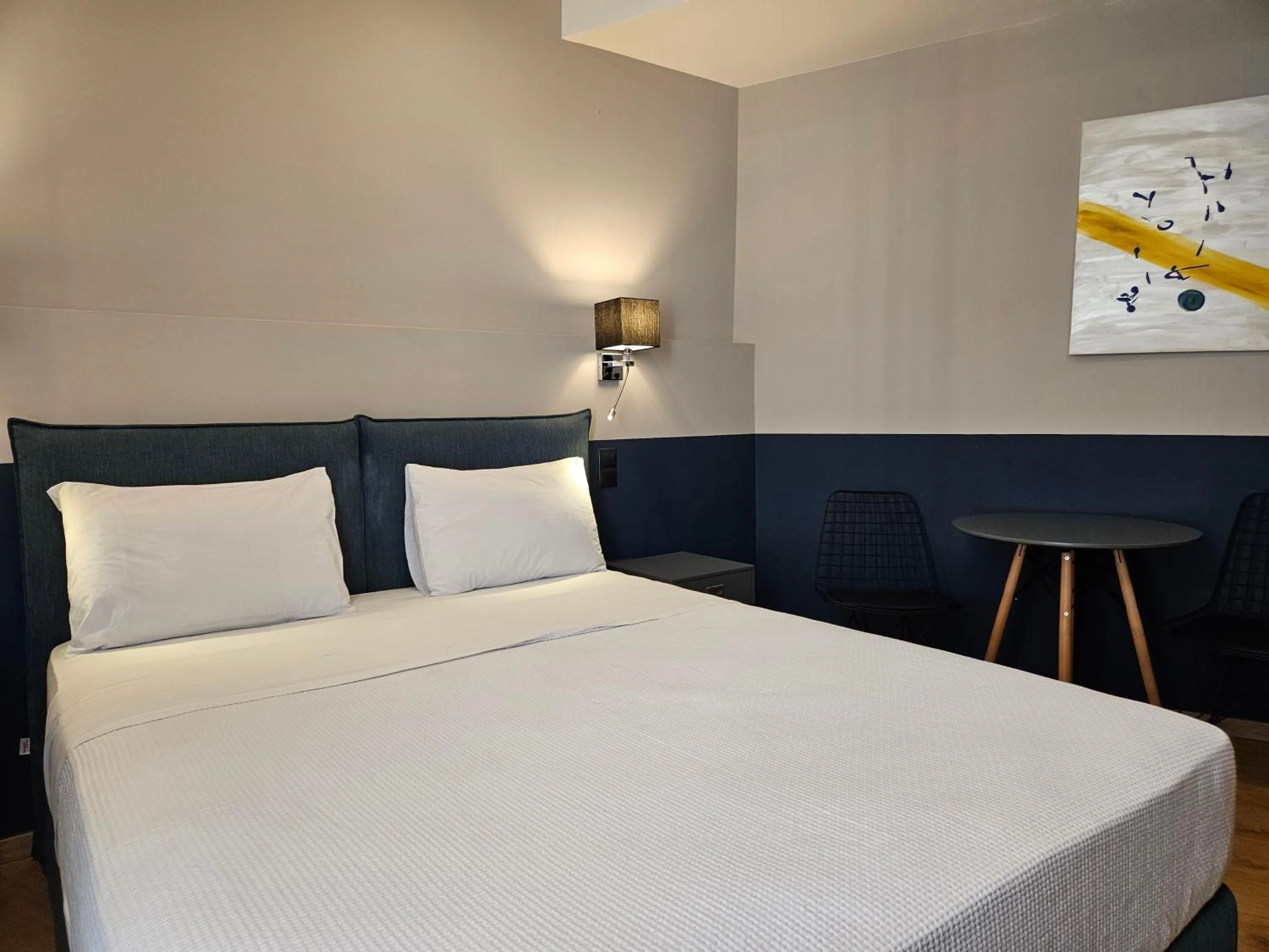 Photo of the whole room, Bed in The Vault Athens