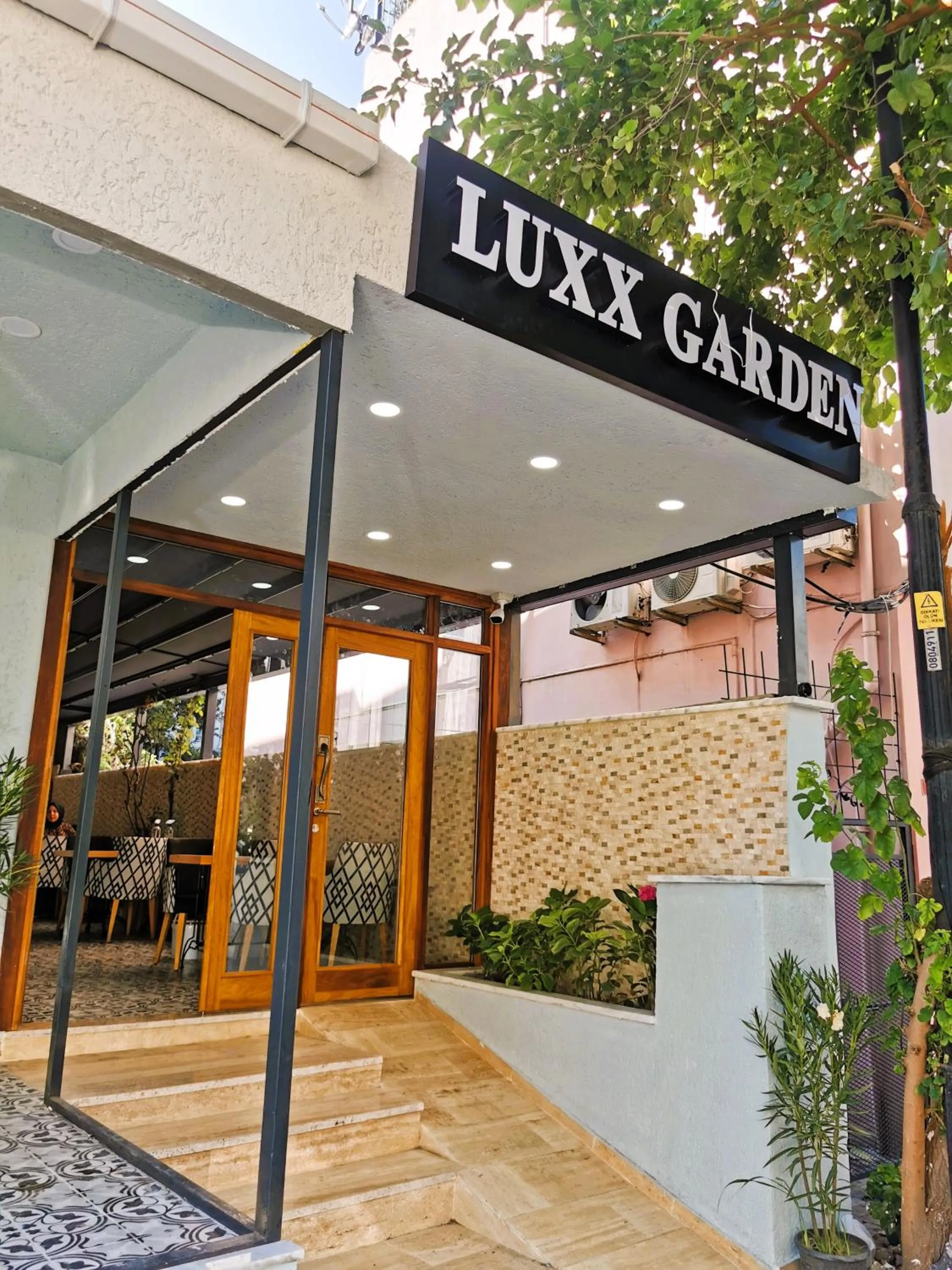 Facade/entrance in Luxx Garden Hotel