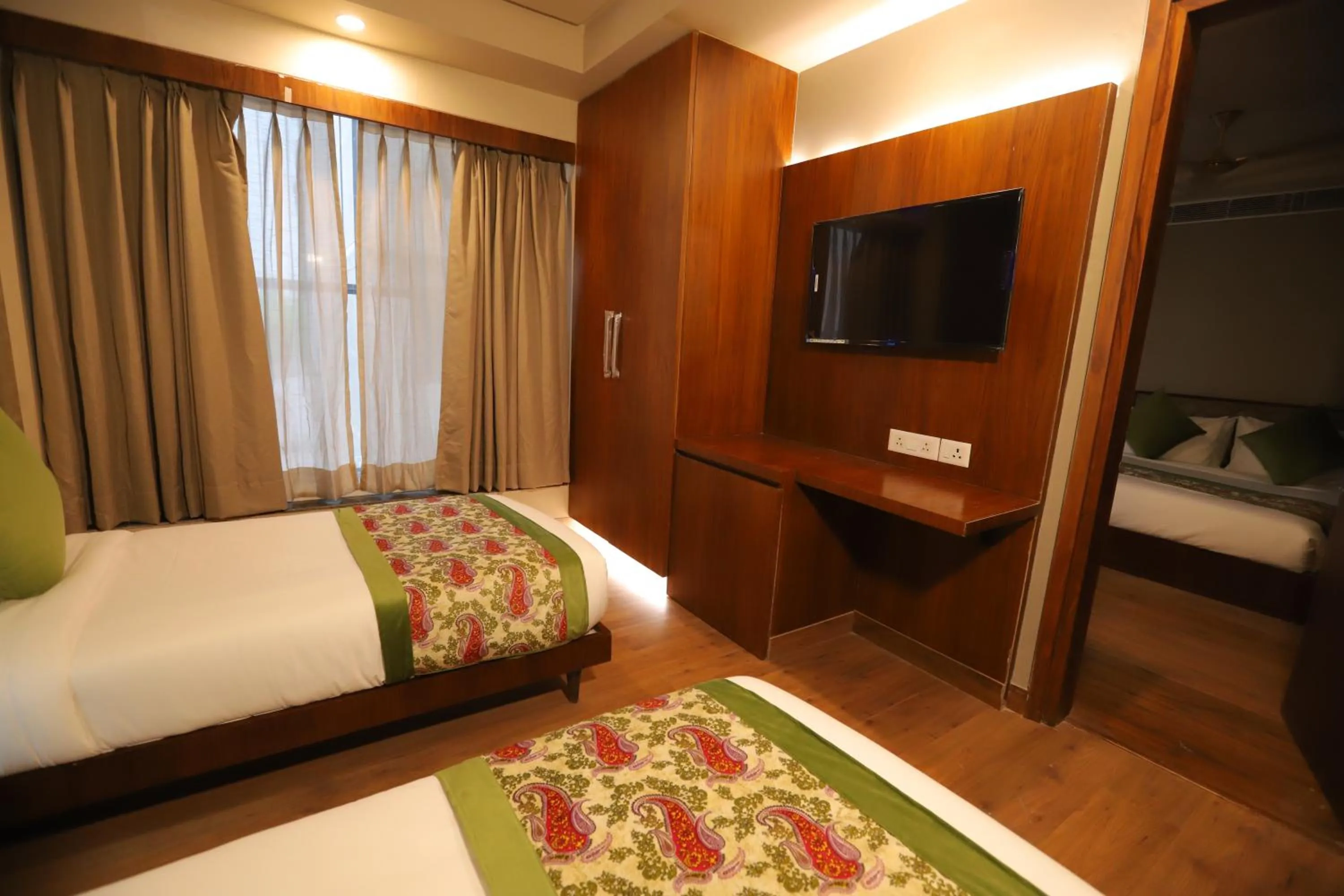 Communal lounge/ TV room, Bed in IP Royal Hotel - New Delhi