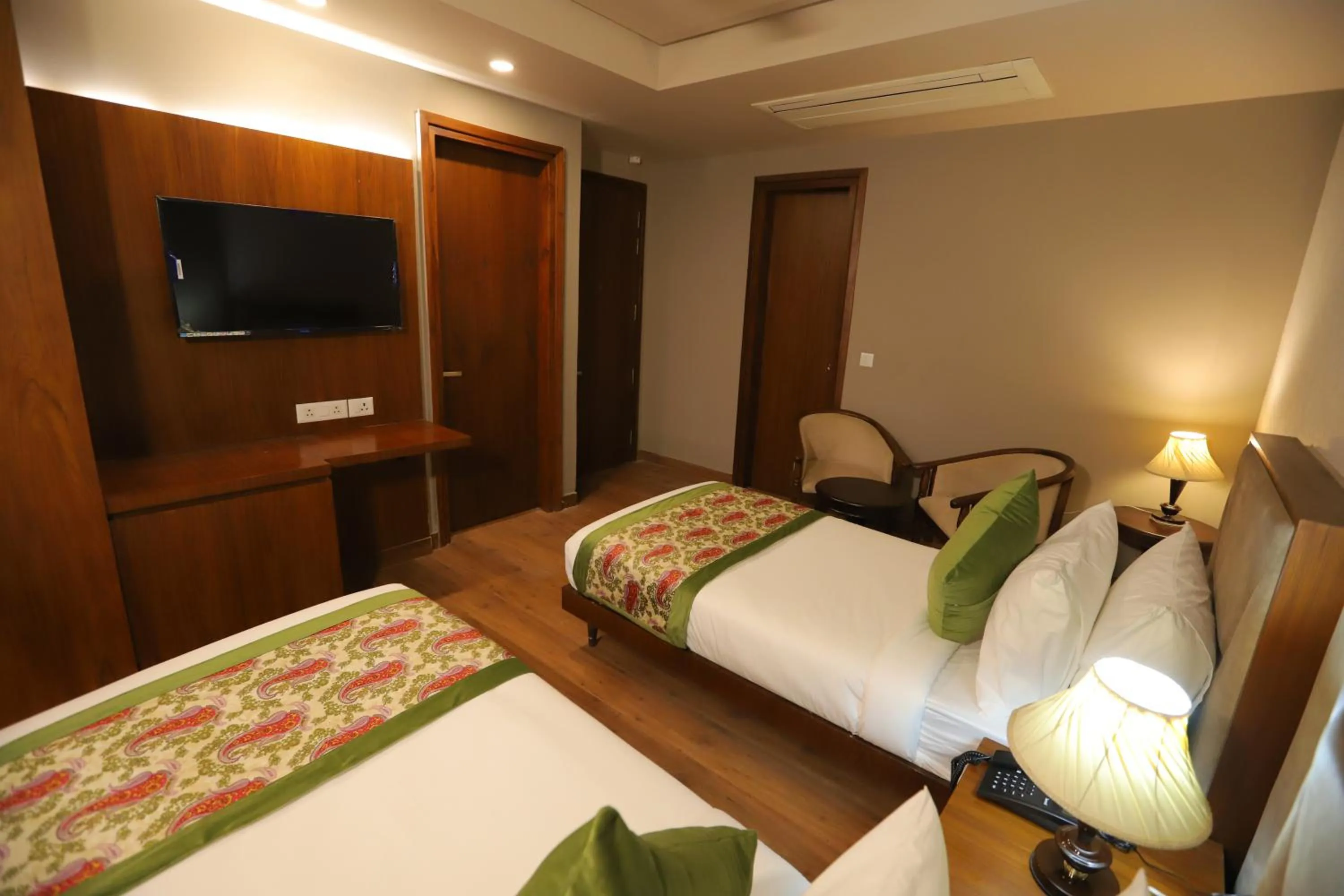 Communal lounge/ TV room, Bed in IP Royal Hotel - New Delhi