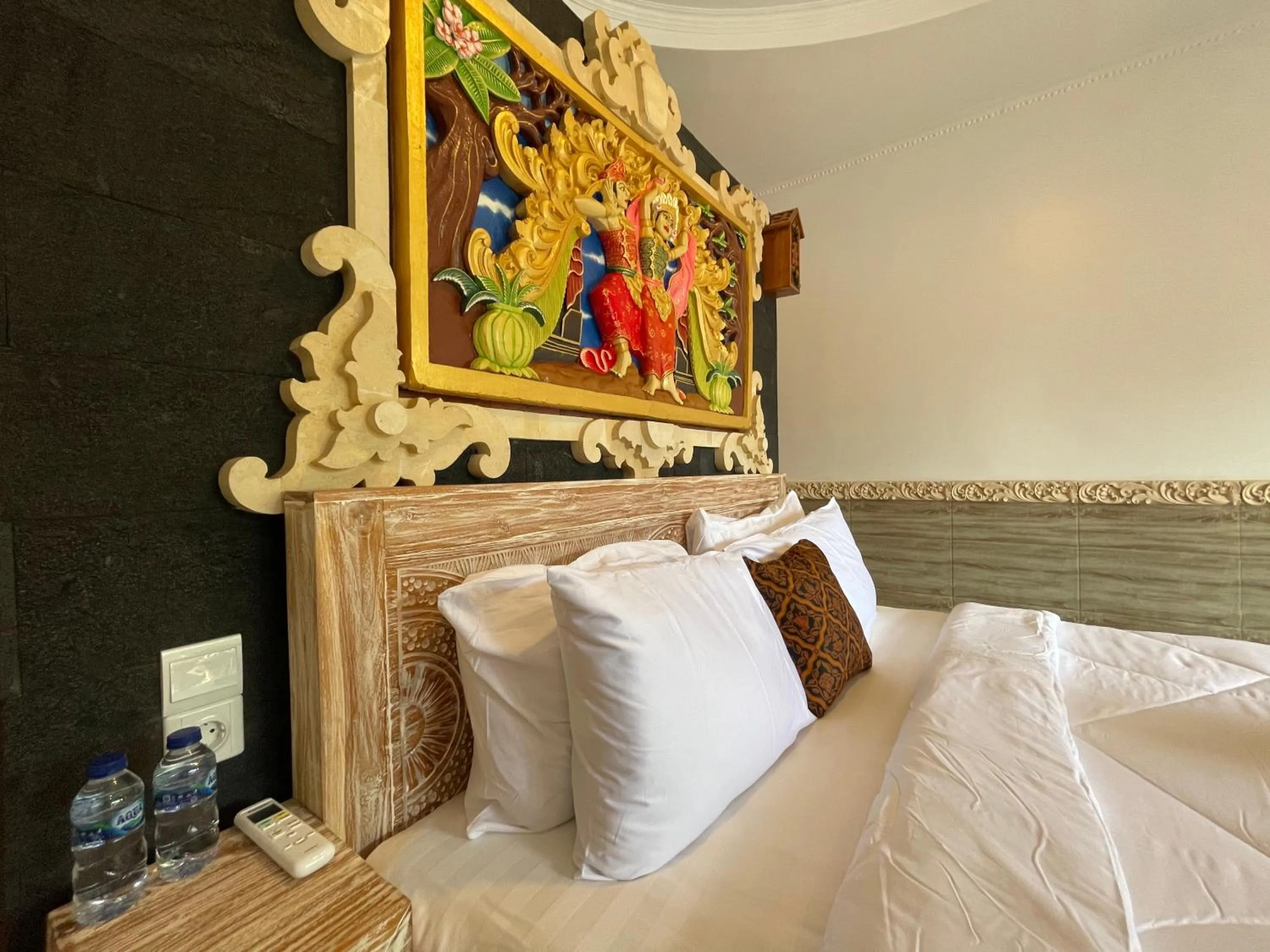 Bed in Mikuk Cottages Canggu