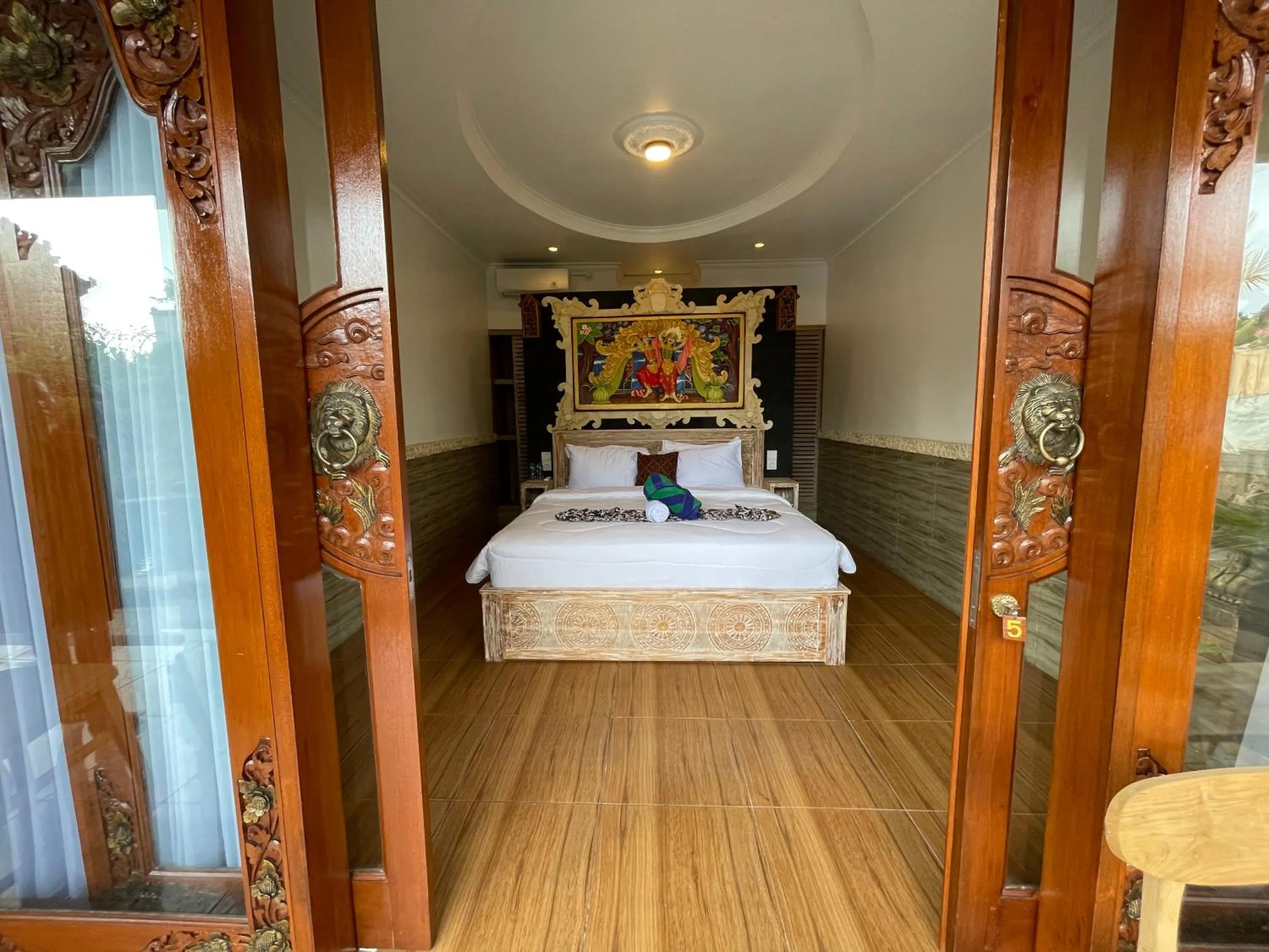Bed in Mikuk Cottages Canggu