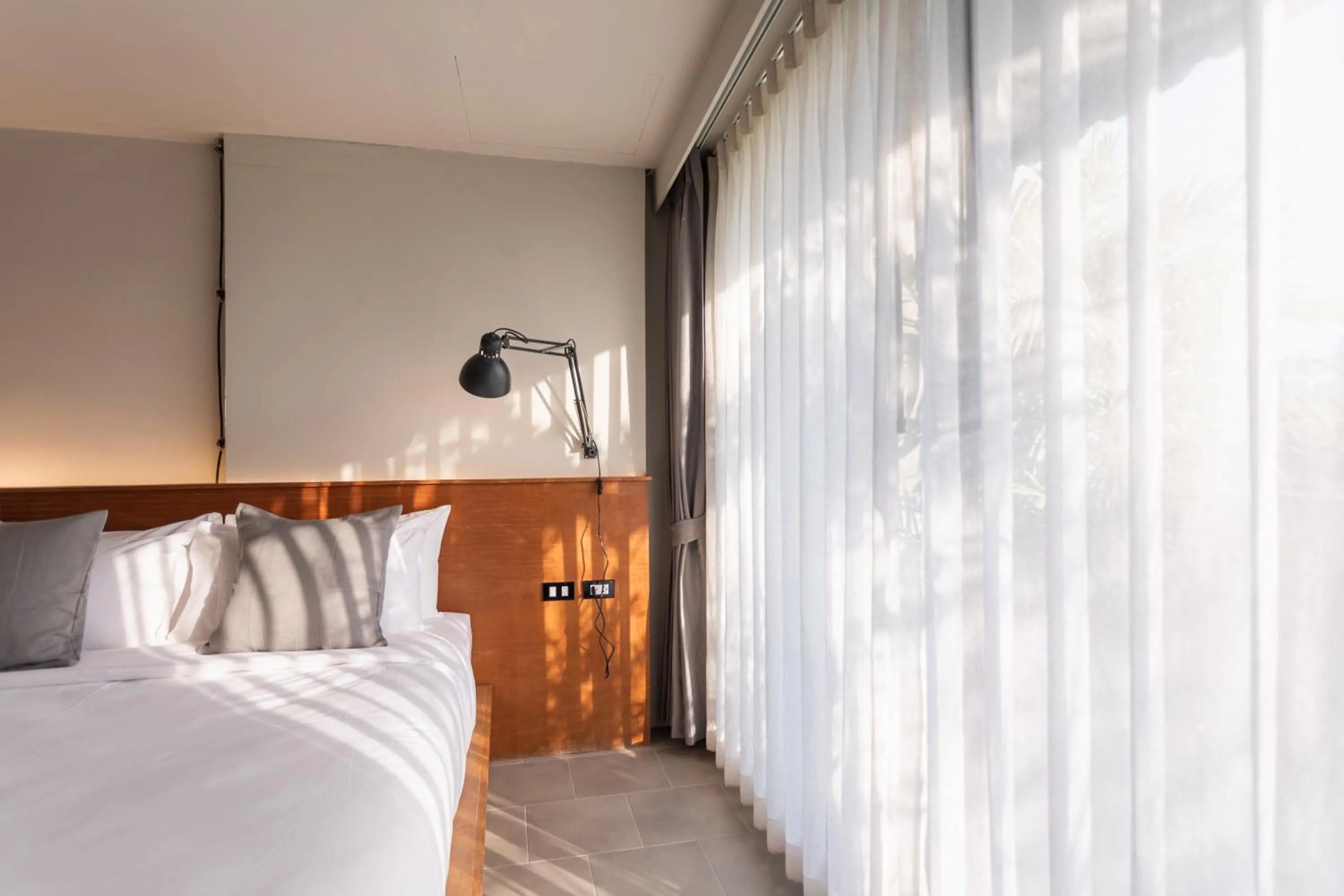 Bed in GalileOasis Boutique Hotel