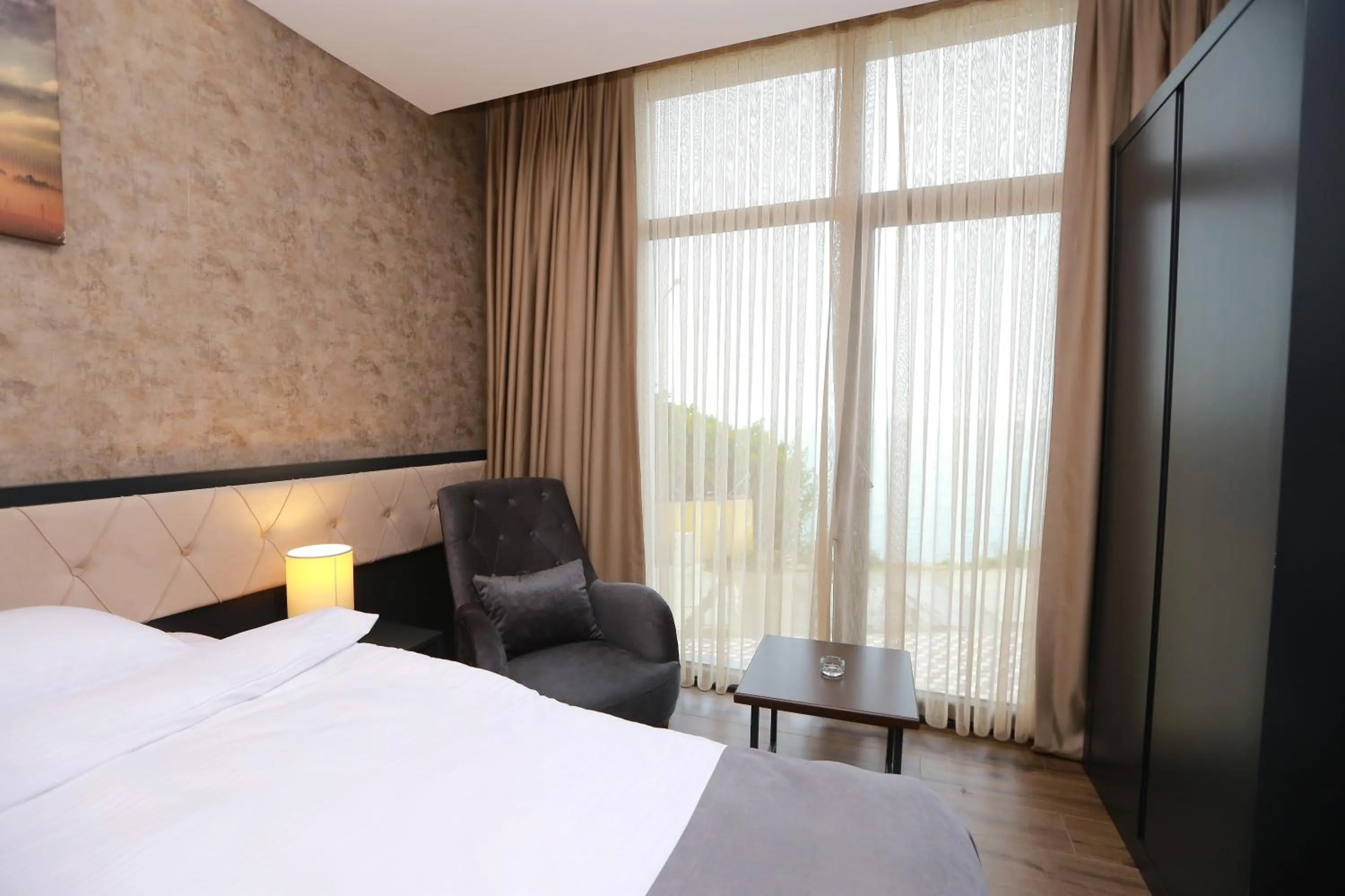 Bed in PENTAHOR HOTEL