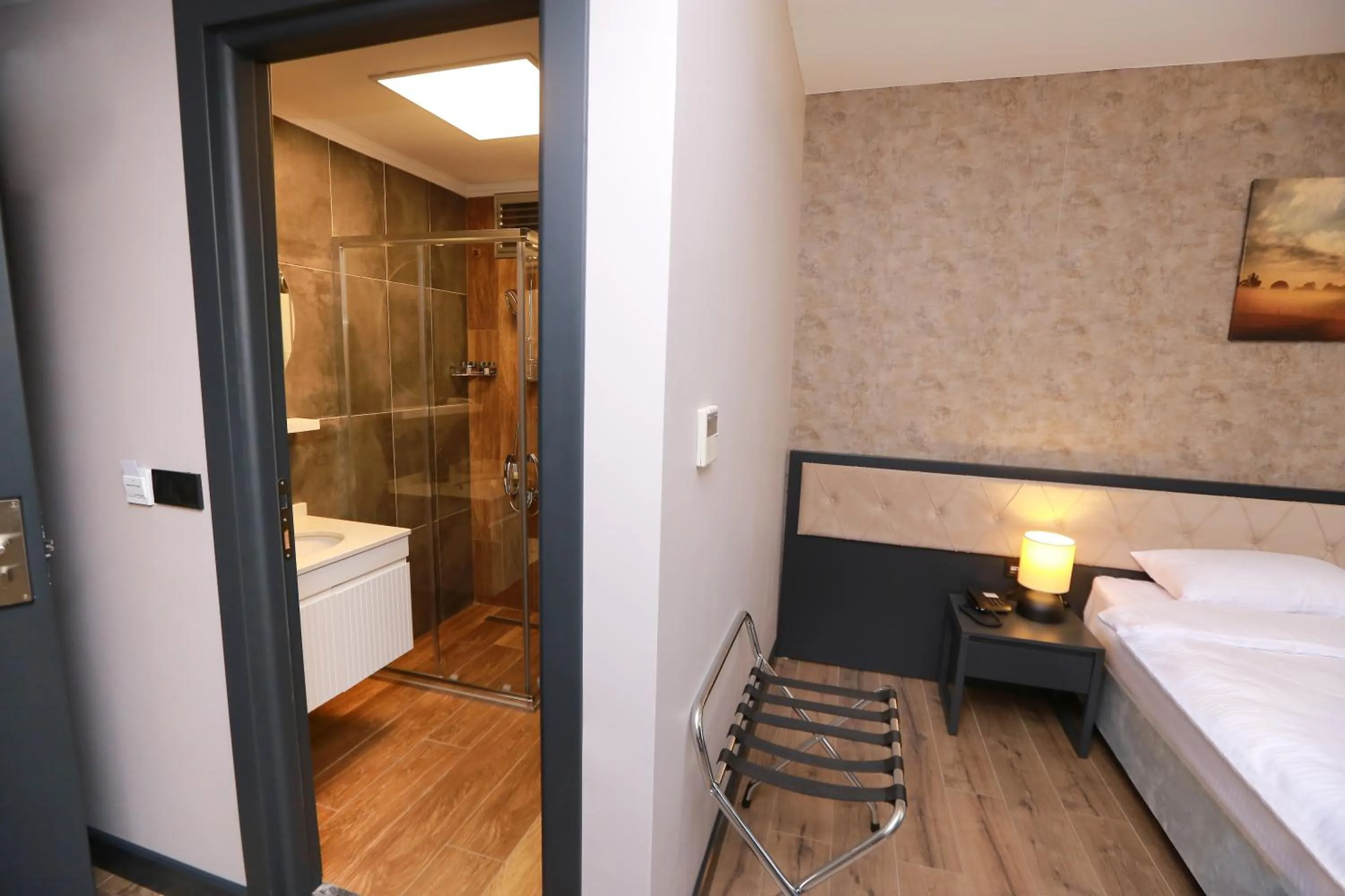 Bed in PENTAHOR HOTEL