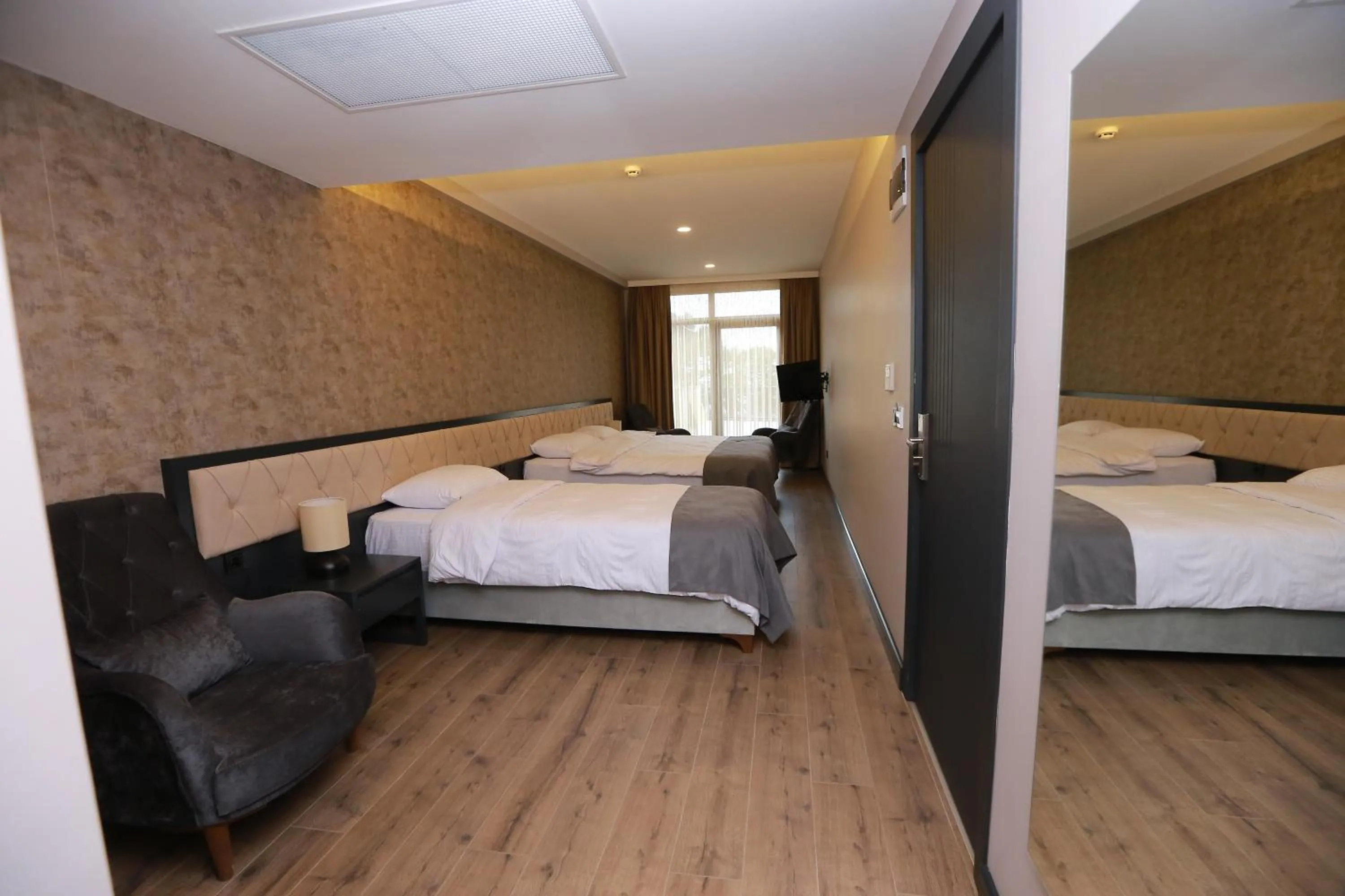 Bed in PENTAHOR HOTEL