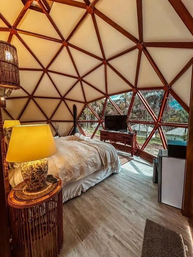 Bed in Embaúba Boutique Hotel