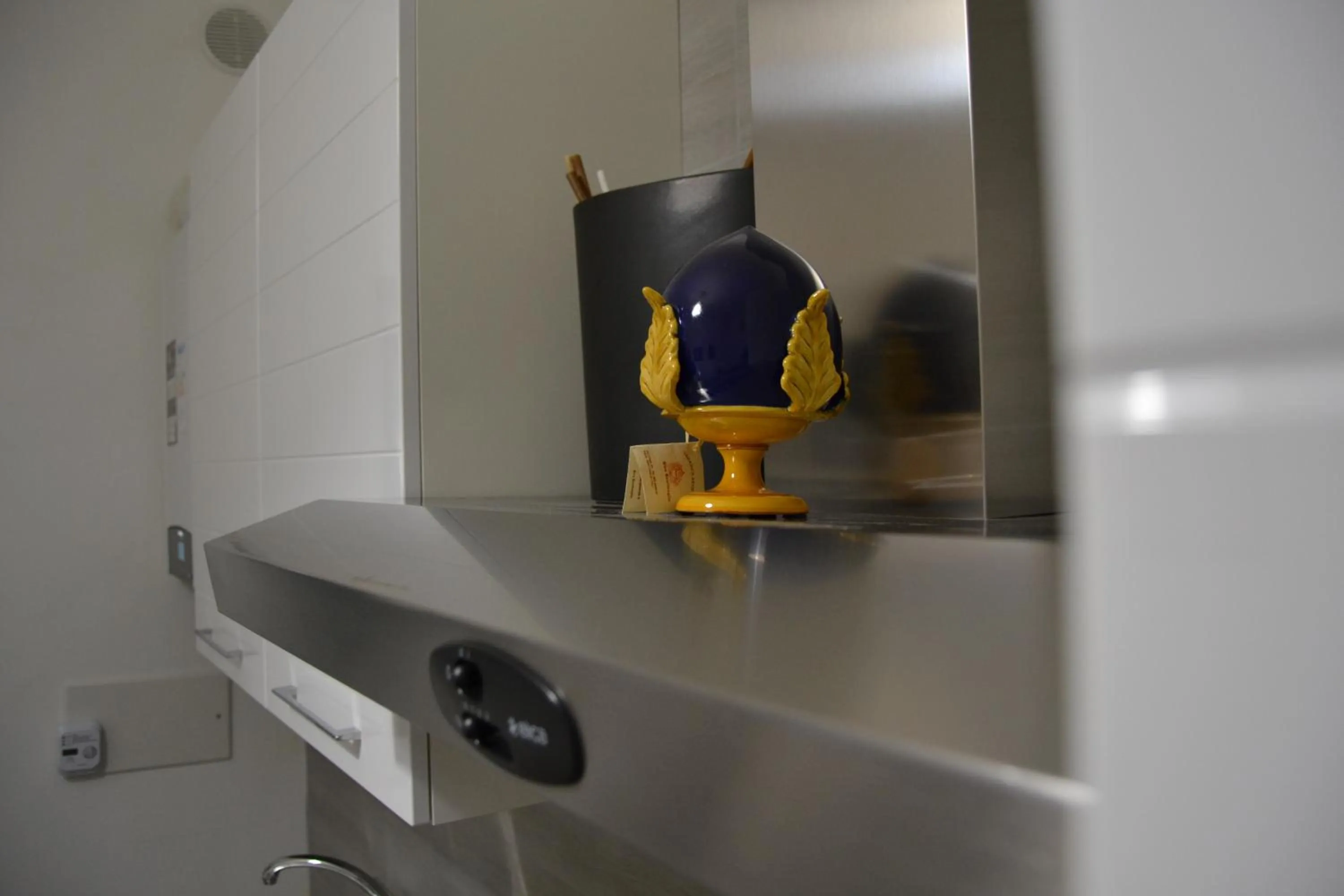 Kitchen or kitchenette in Karina's Rooms