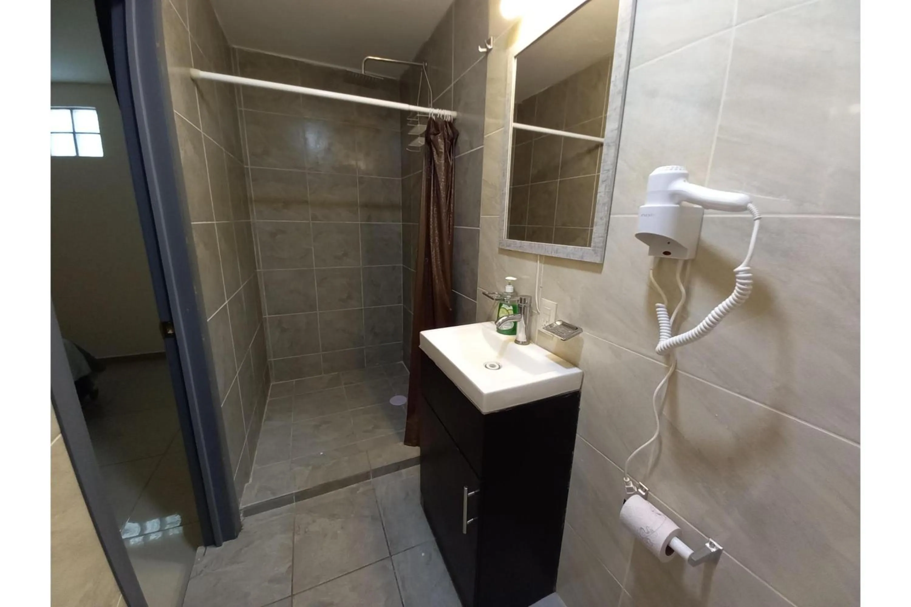 Bathroom in Capital O Tu Estancia