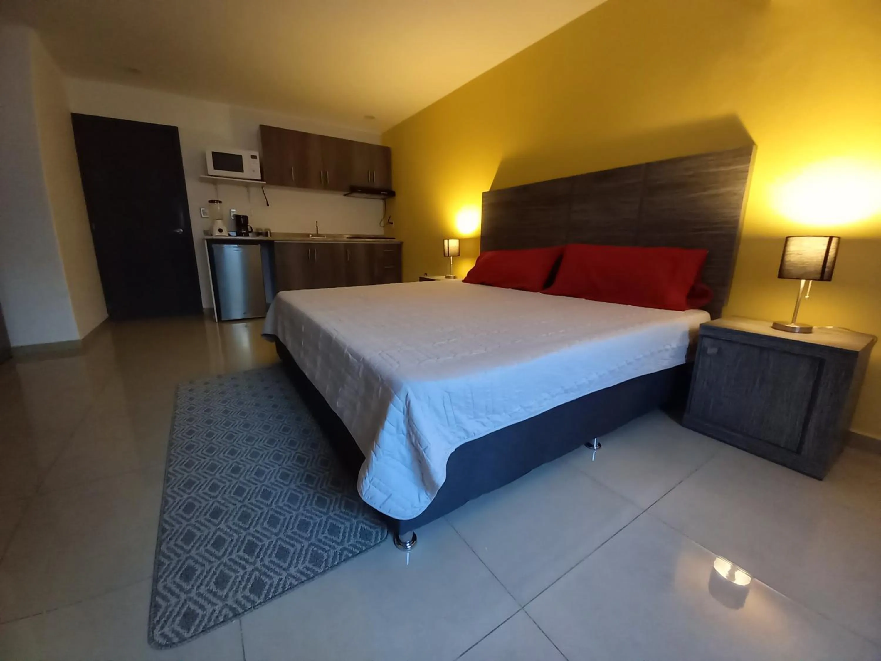 Bed in Capital O Tu Estancia