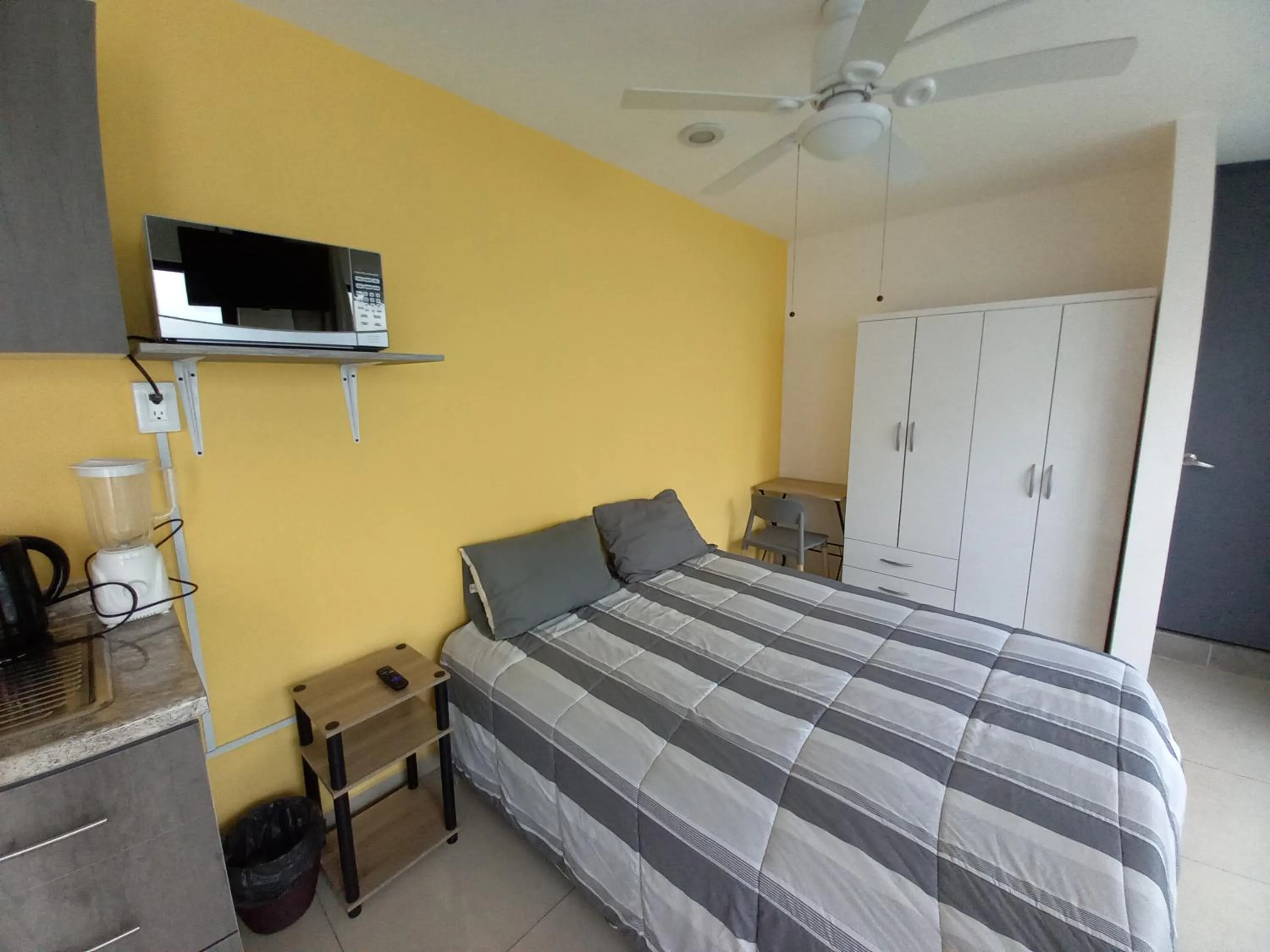 Bedroom, Bed in Capital O Tu Estancia