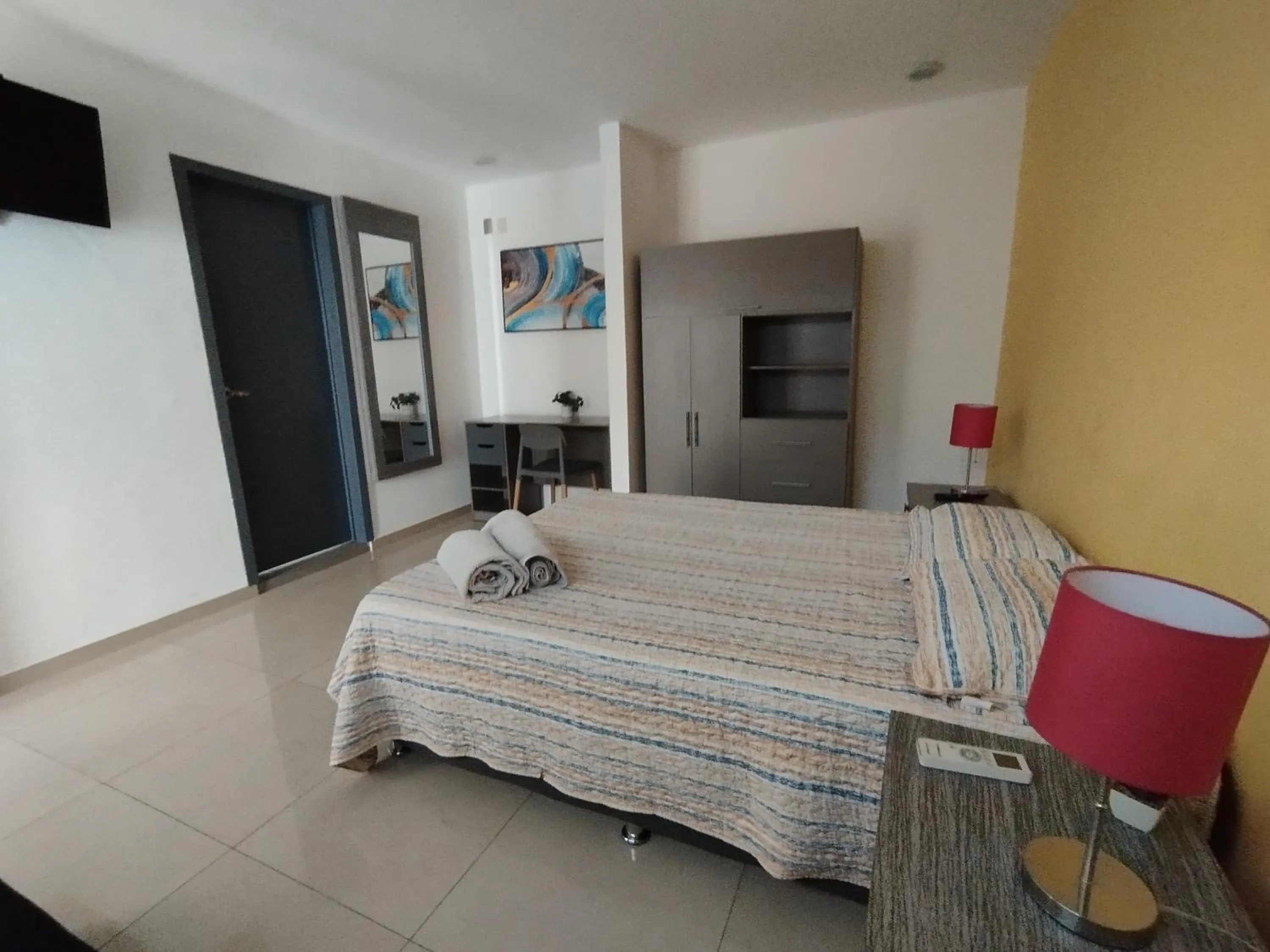 Bedroom, Bed in Capital O Tu Estancia