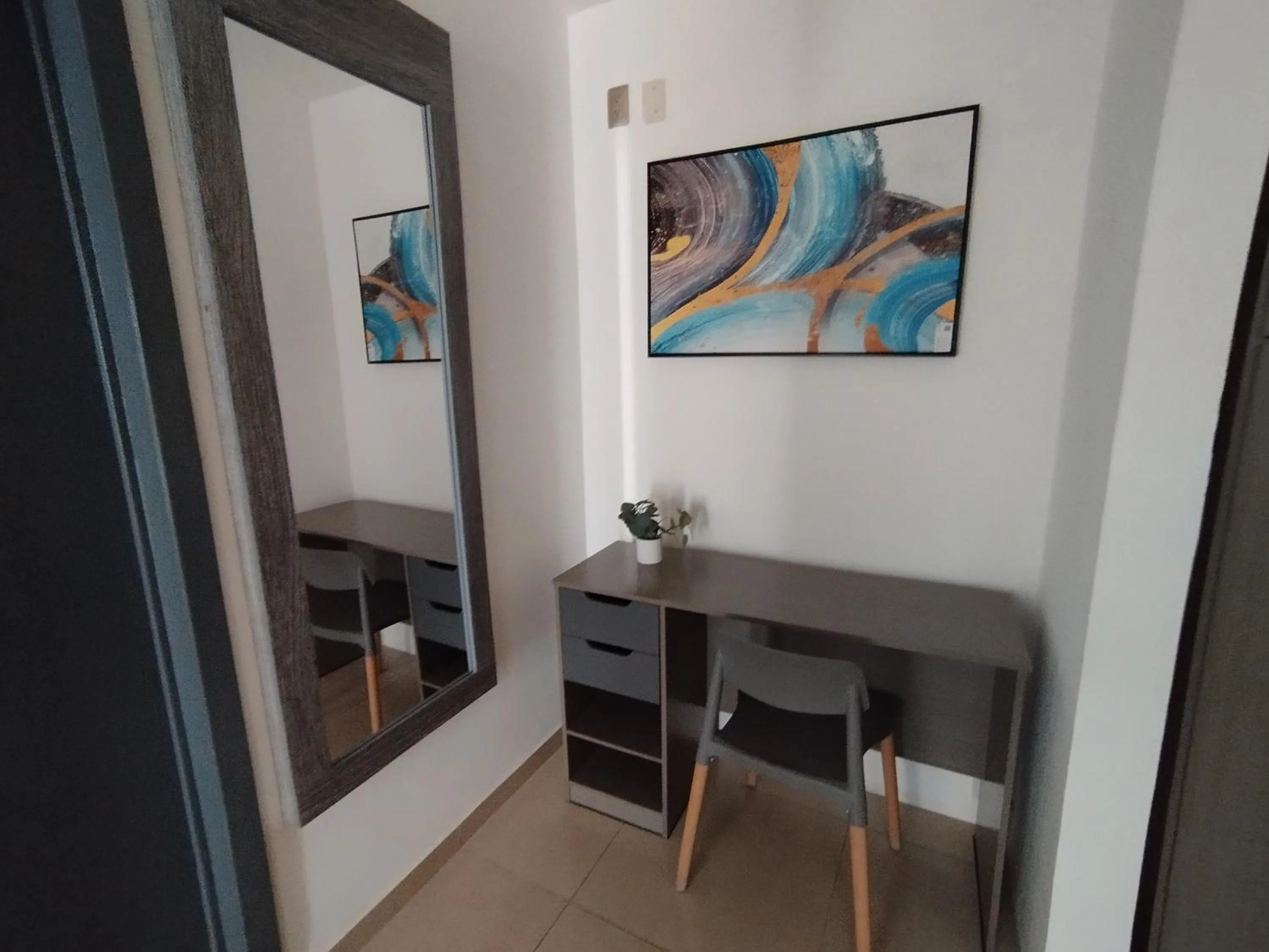 Seating area in Capital O Tu Estancia