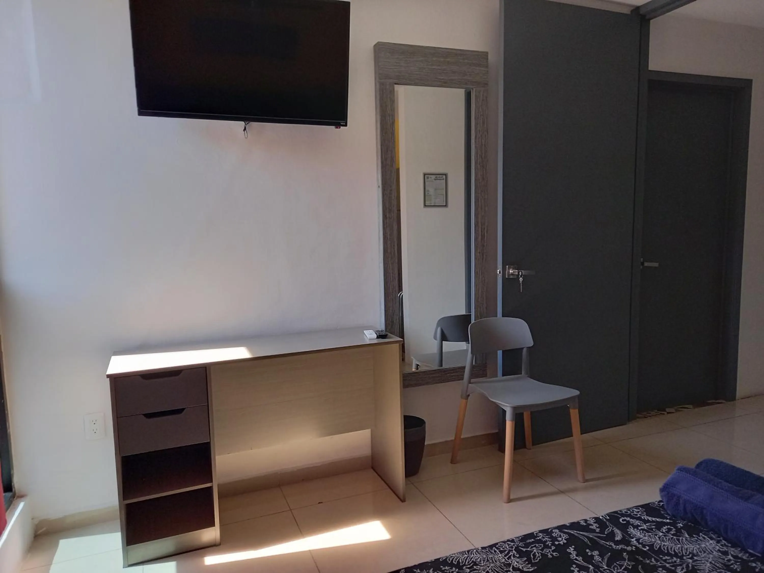 Bedroom in Capital O Tu Estancia