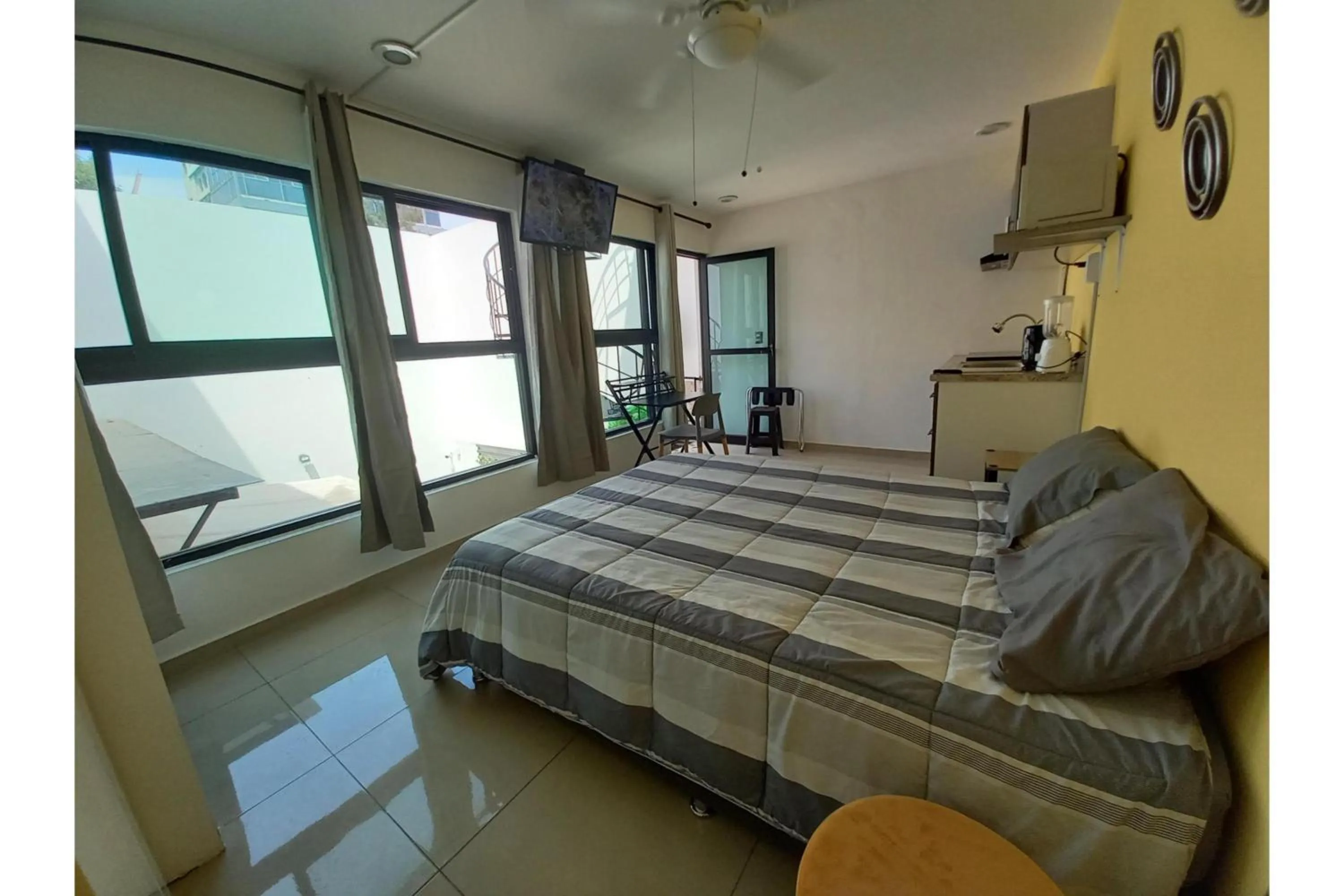 Bedroom, Bed in Capital O Tu Estancia