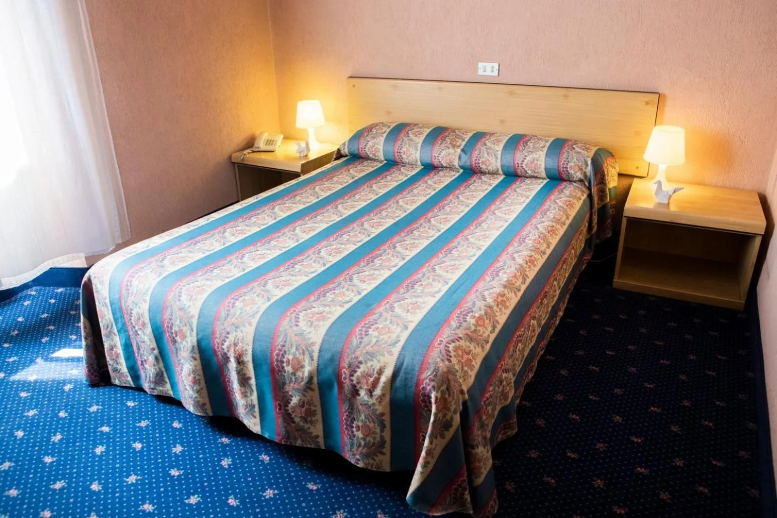 Bedroom, Bed in Hotel Milano Pool & Garden