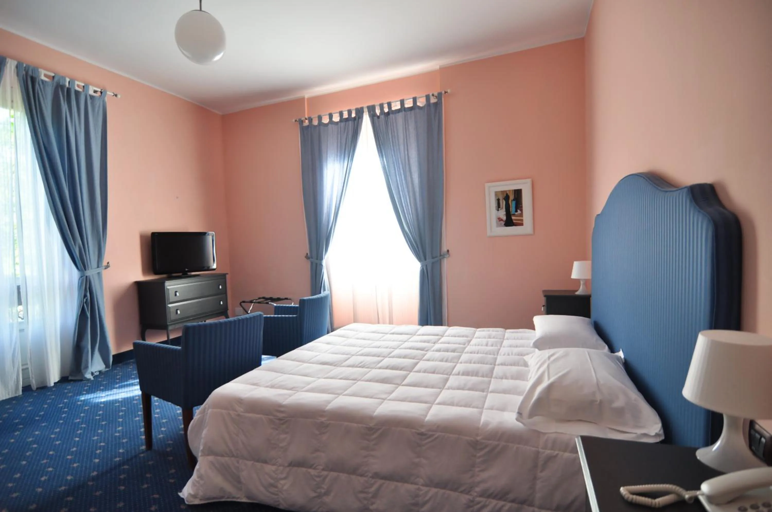 Photo of the whole room, Bed in Hotel Milano Pool & Garden