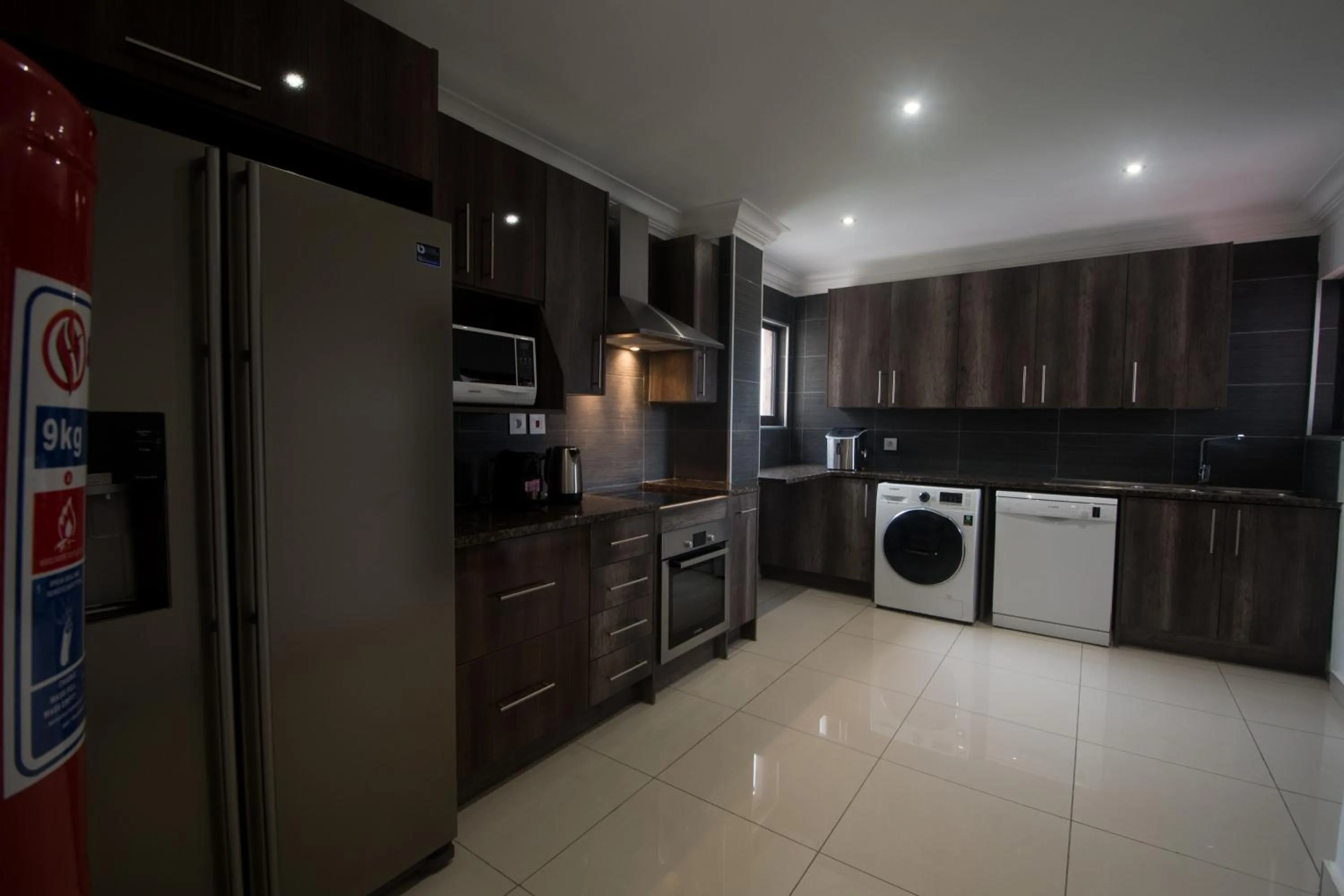 Kitchen or kitchenette in WDC APARTHOTEL - BUEA