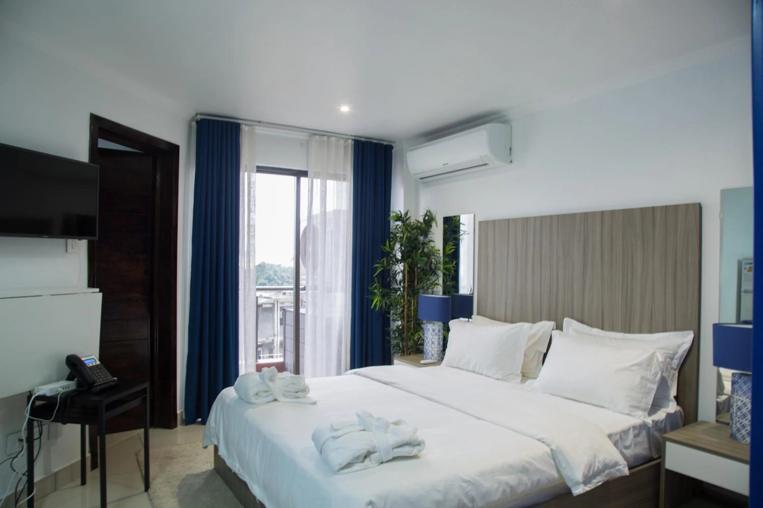 Bedroom, Bed in WDC APARTHOTEL - BUEA