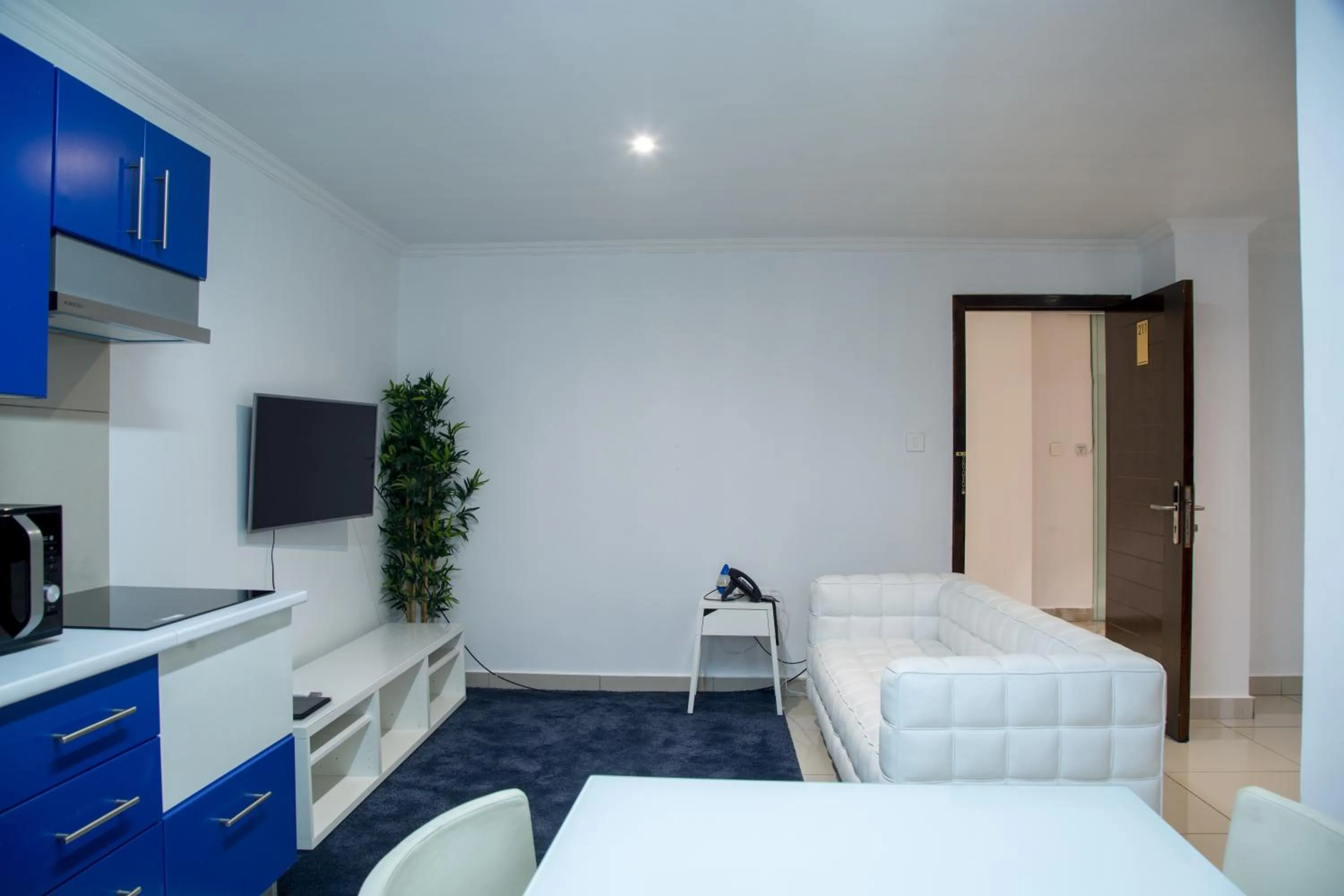 Living room, Bed in WDC APARTHOTEL - BUEA